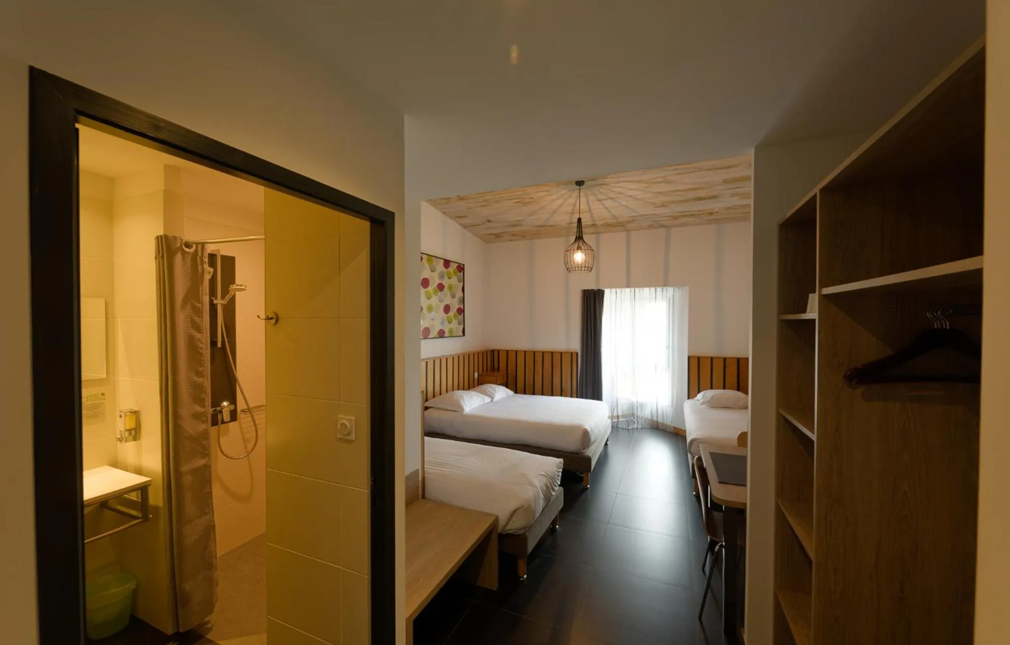 Photo of the whole room, Bed in Cit'Hôtel le Relais Boisniard