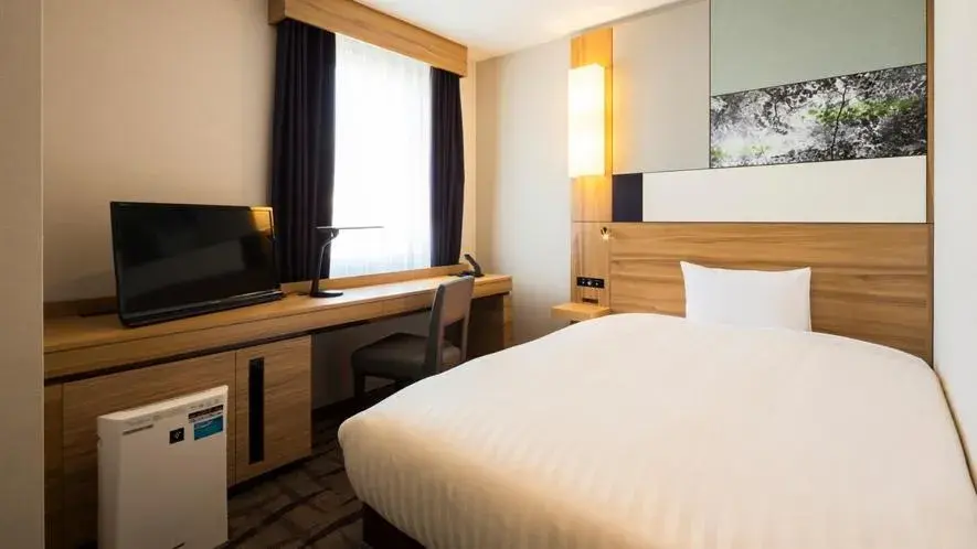 Bed in JR-East Hotel Mets Kokubunji Bed in JR-East Hotel Mets Kokubunji