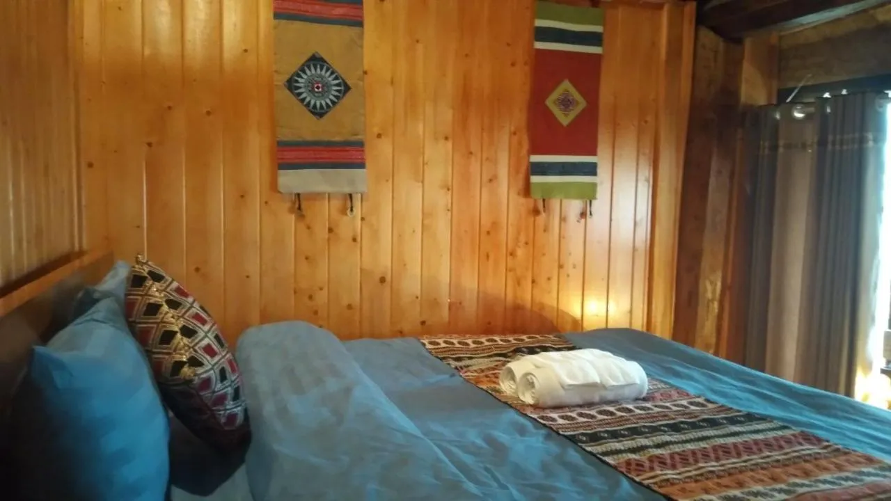 Bed in Ta Xua Ecolodge