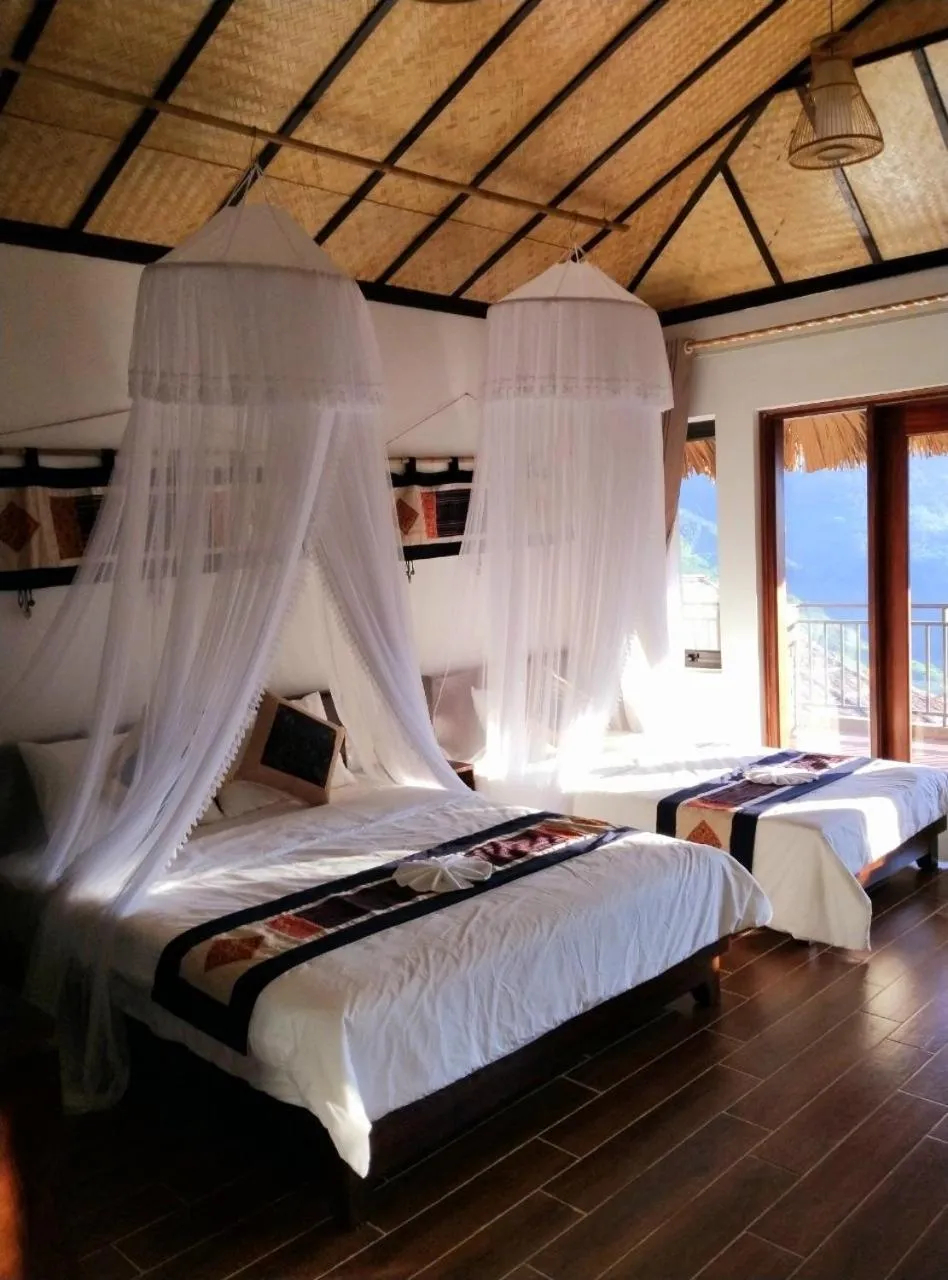 Bed in Ta Xua Ecolodge