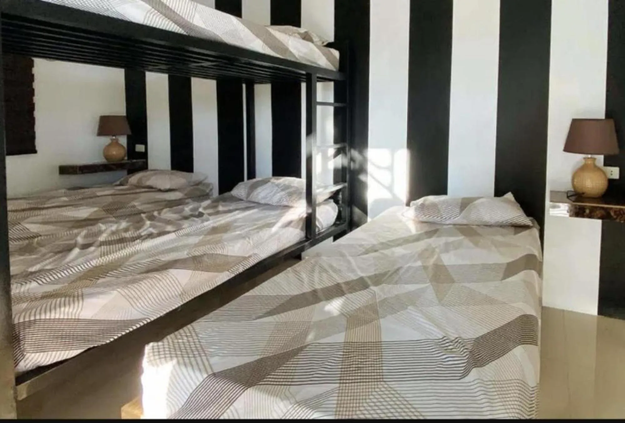 Bed in RedDoorz @ Piamonte Apartelle Santo Tomas Batangas