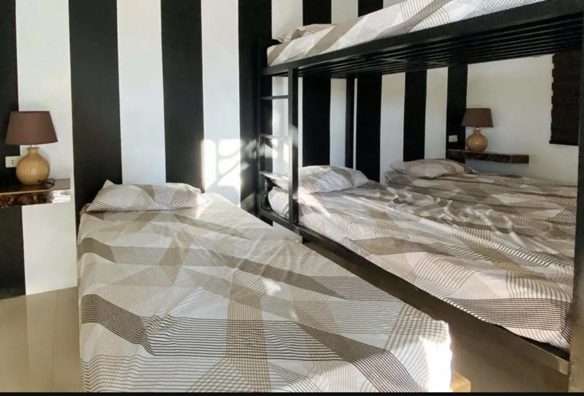 Bed in RedDoorz @ Piamonte Apartelle Santo Tomas Batangas