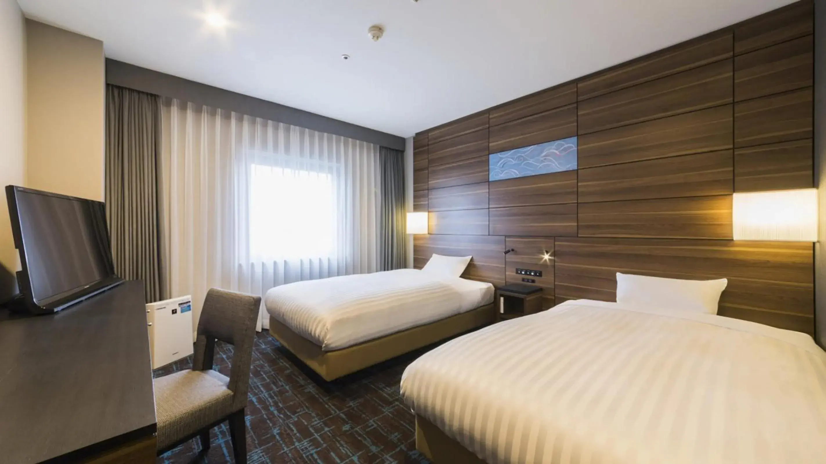 Bed in JR-East Hotel Mets Tsudanuma Bed in JR-East Hotel Mets Tsudanuma