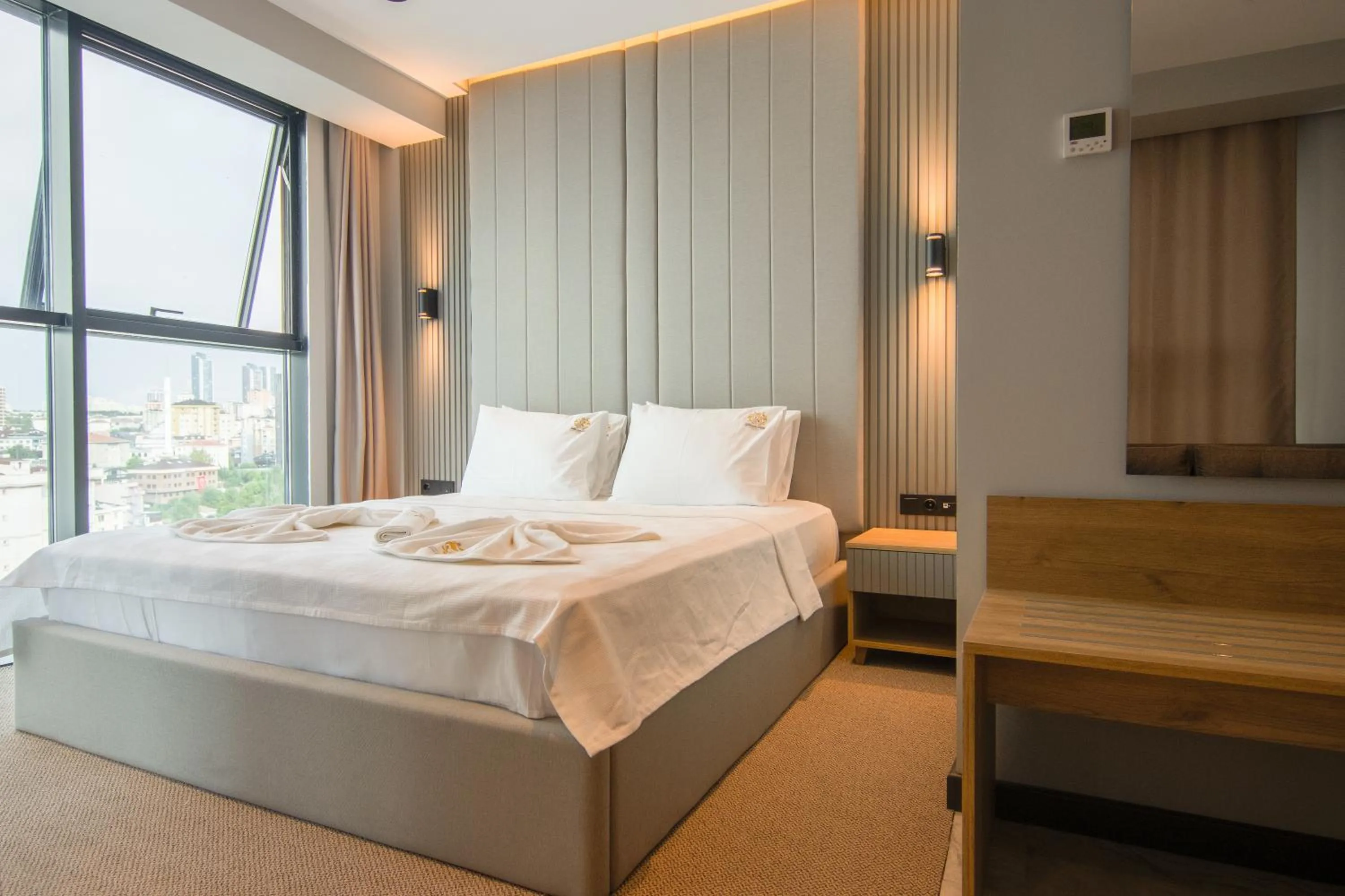 Bed in SHERLOCK HOMES HOTELS