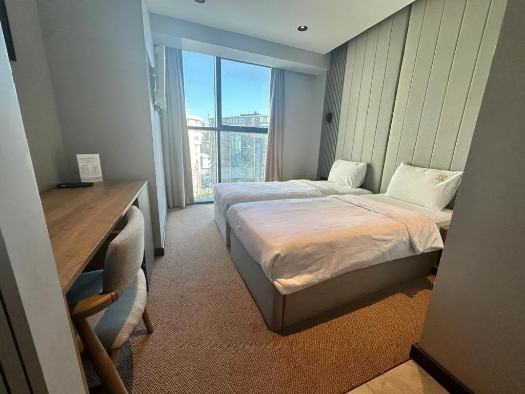 Bed in SHERLOCK HOMES HOTELS