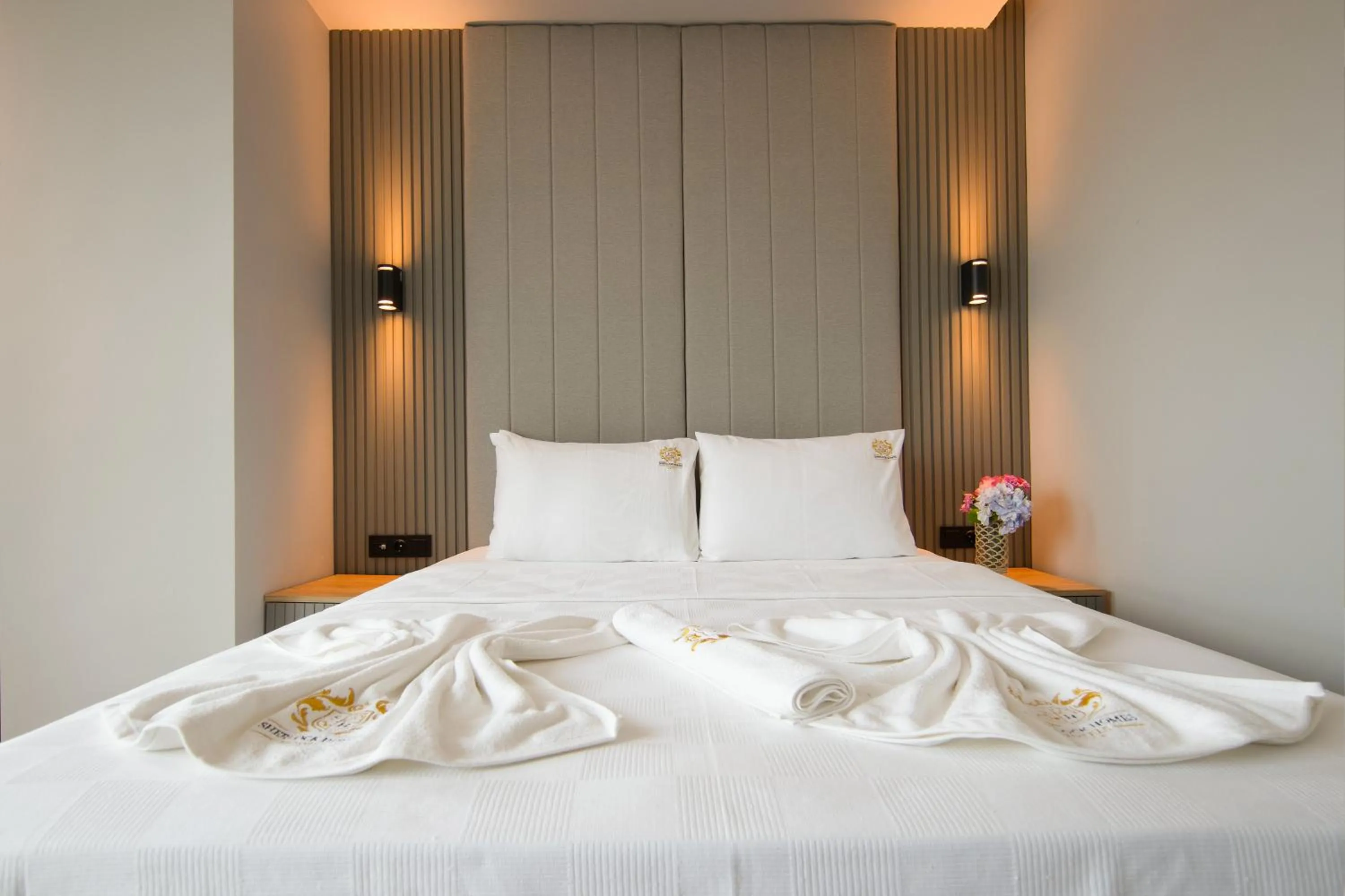 Bed in SHERLOCK HOMES HOTELS