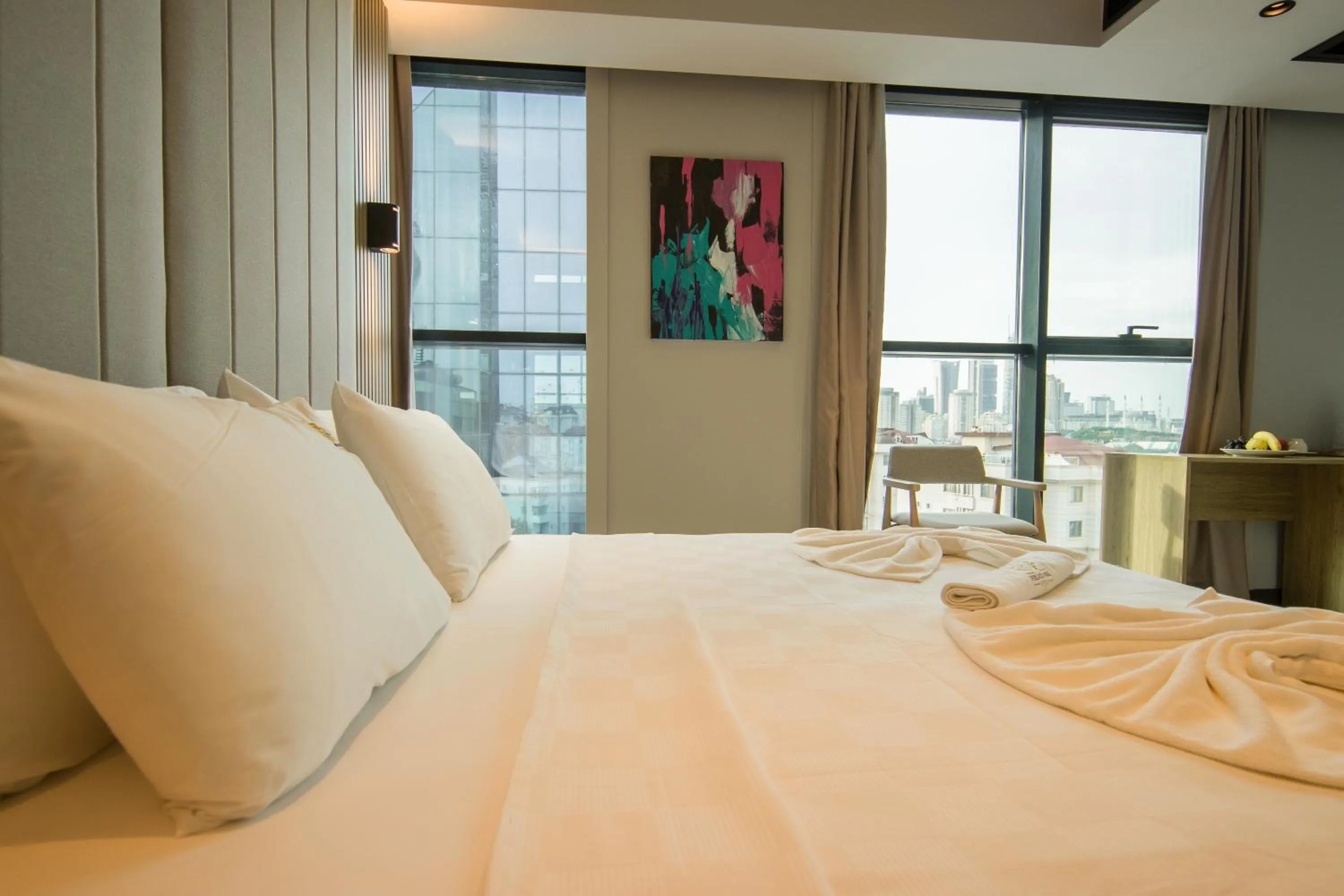 Bed in SHERLOCK HOMES HOTELS