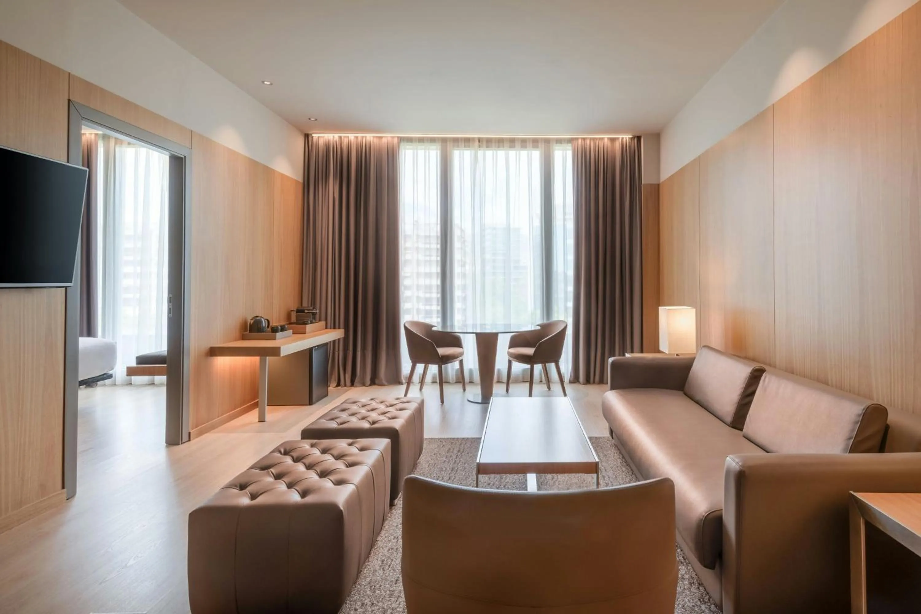 Living room in AC Hotel Diagonal L'Illa by Marriott