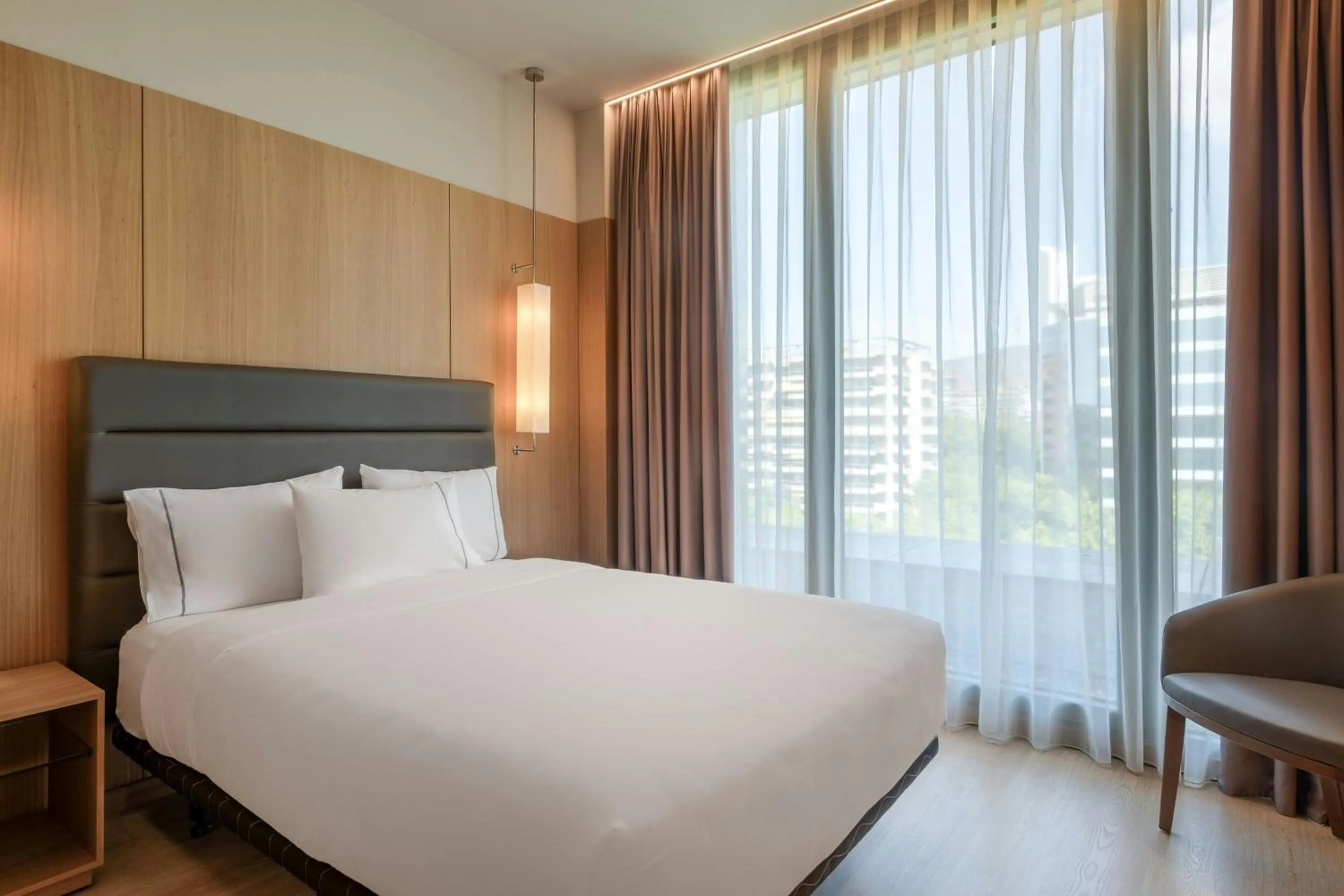 Photo of the whole room, Bed in AC Hotel Diagonal L'Illa by Marriott