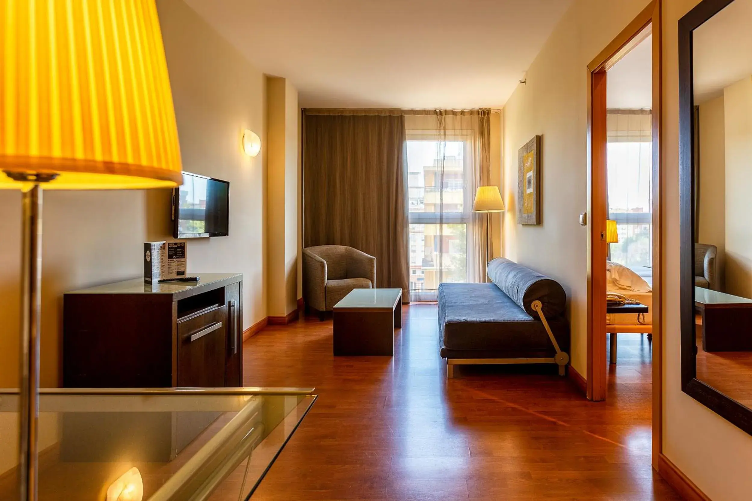 Seating area, Bed in Vértice Sevilla Seating area, Bed in Vértice Sevilla