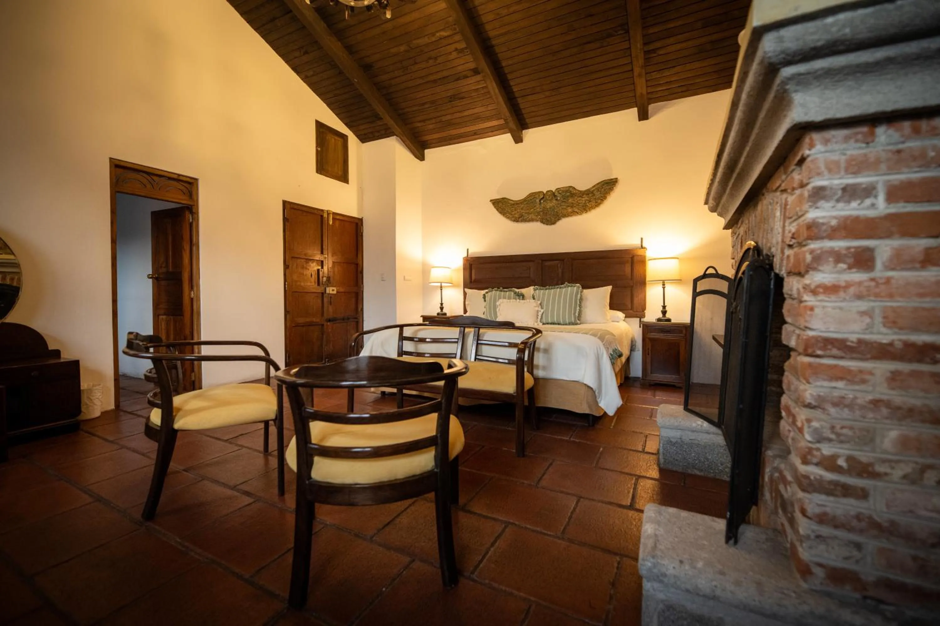 Seating area, Bed in Hotel La Villa Serena