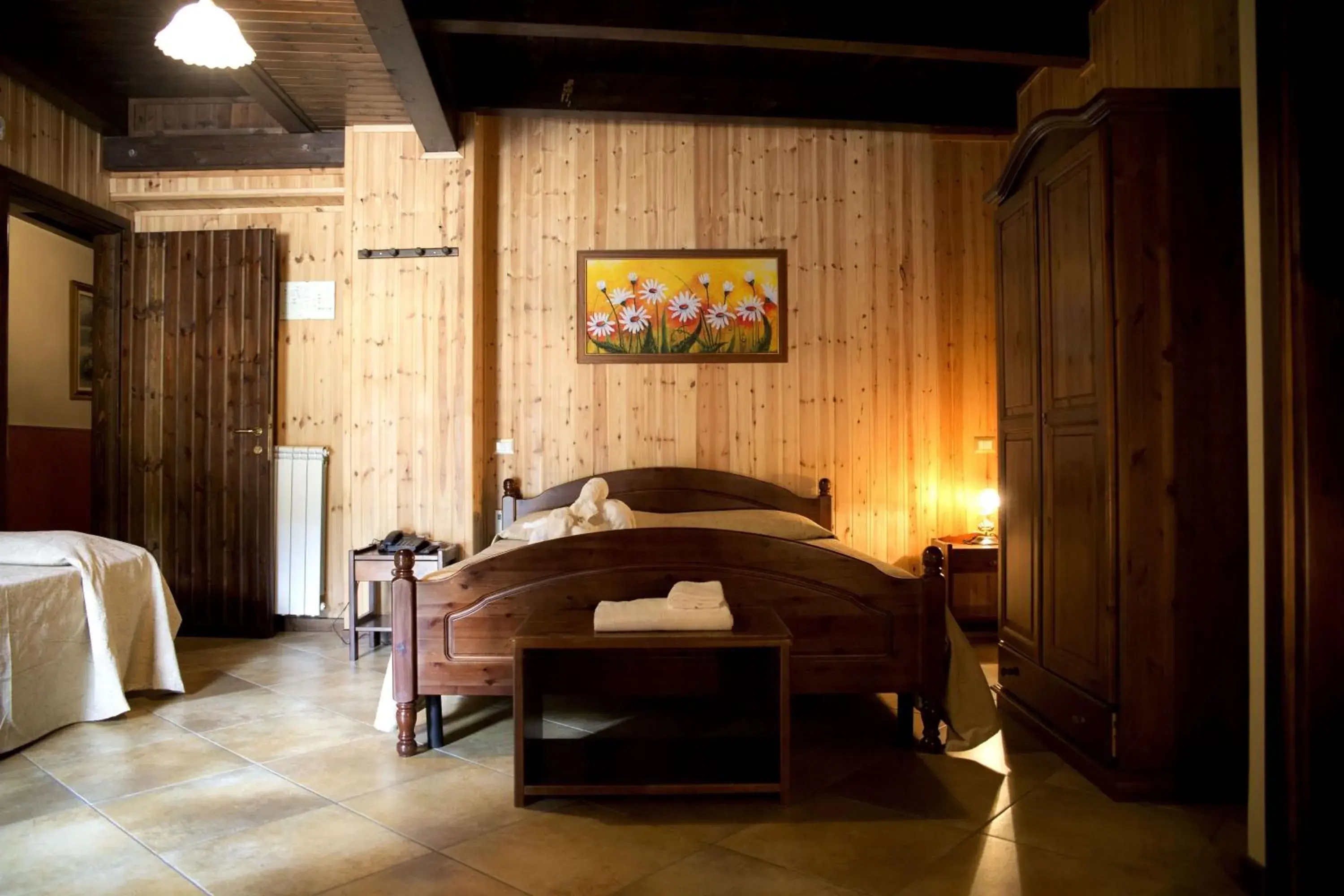 Triple Room in Hotel Palaghiaccio Triple Room in Hotel Palaghiaccio