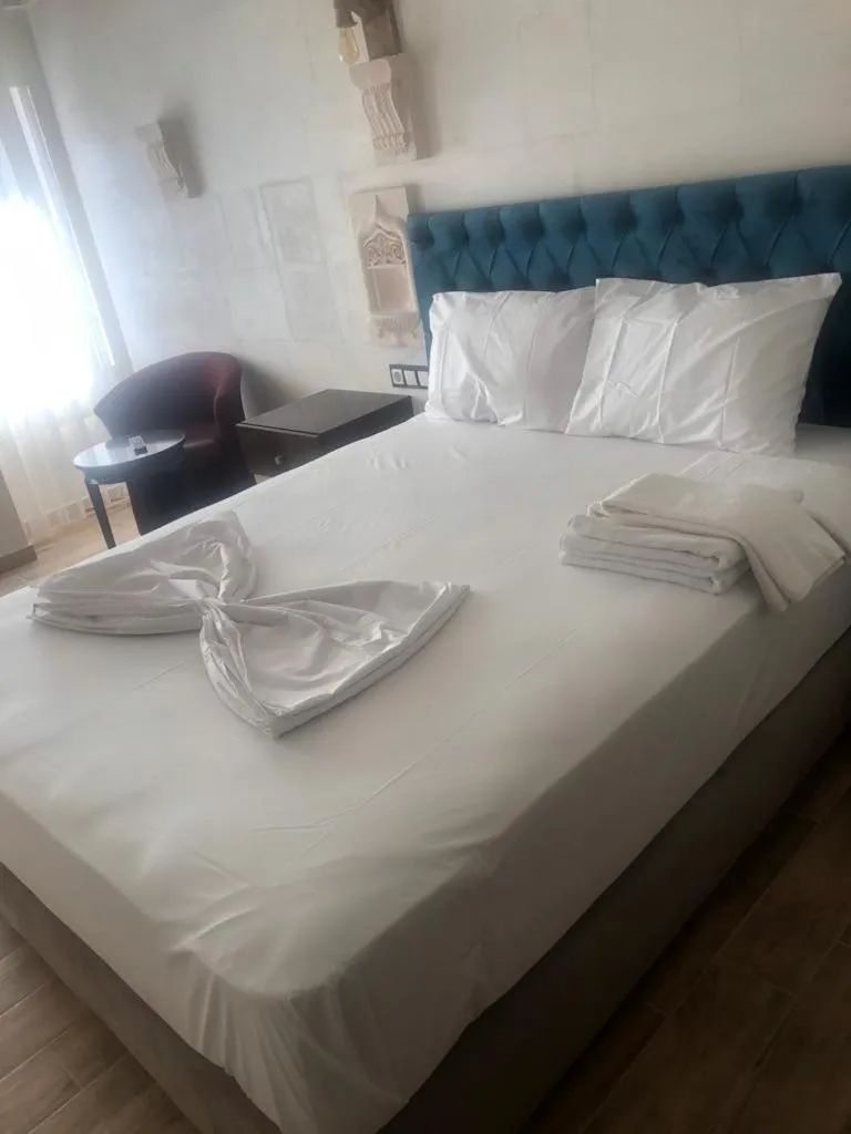 Bed in MİDYAT LADİNOS OTEL