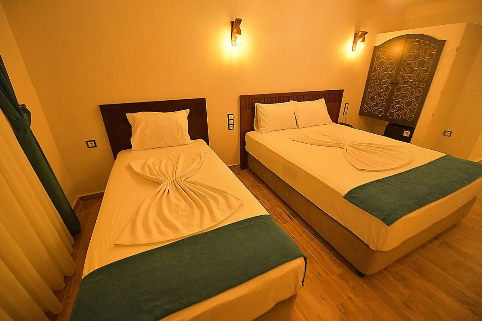 Bed in MİDYAT LADİNOS OTEL