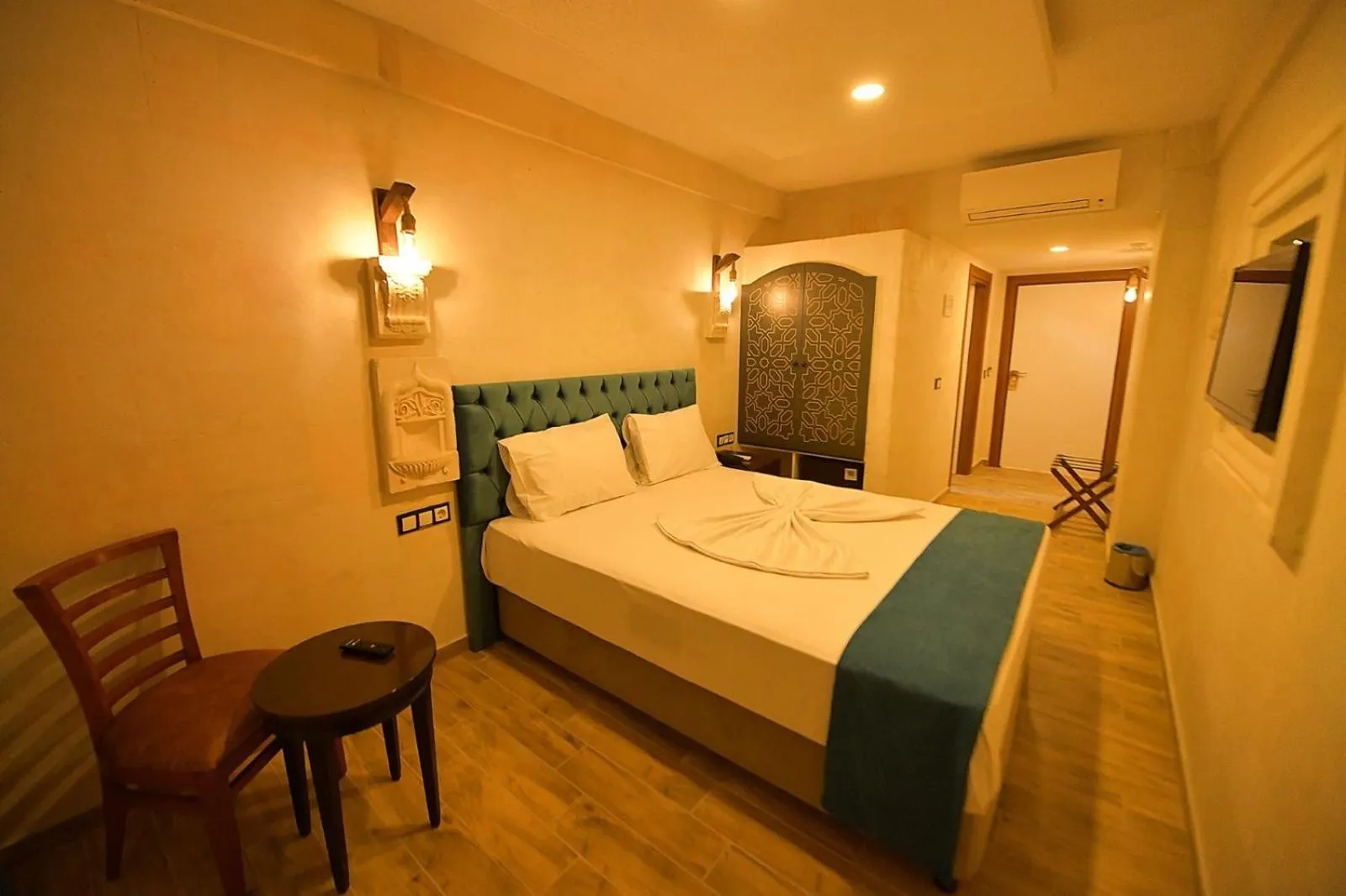 Bed in MİDYAT LADİNOS OTEL