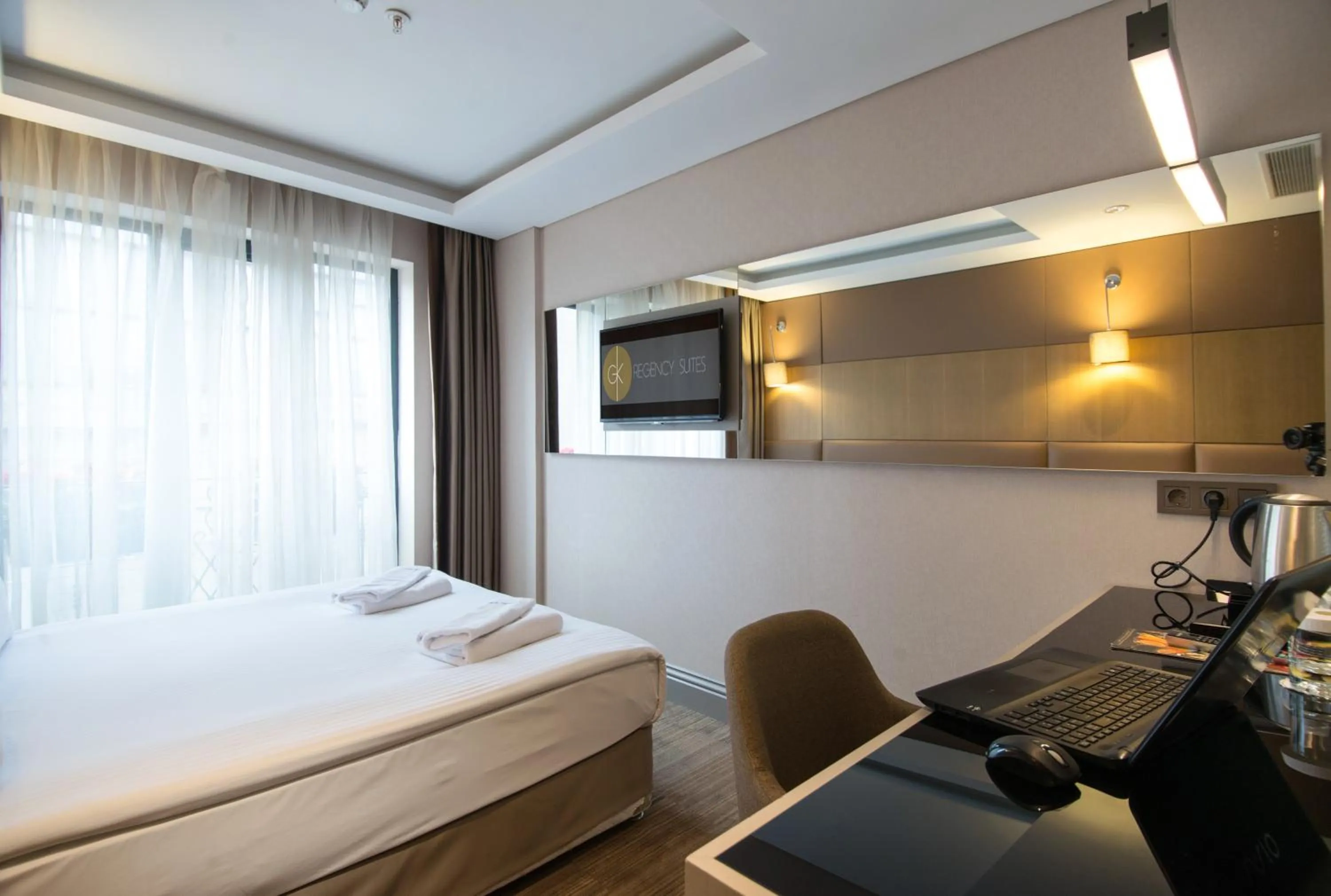 Photo of the whole room in GK Regency Suites Hotel