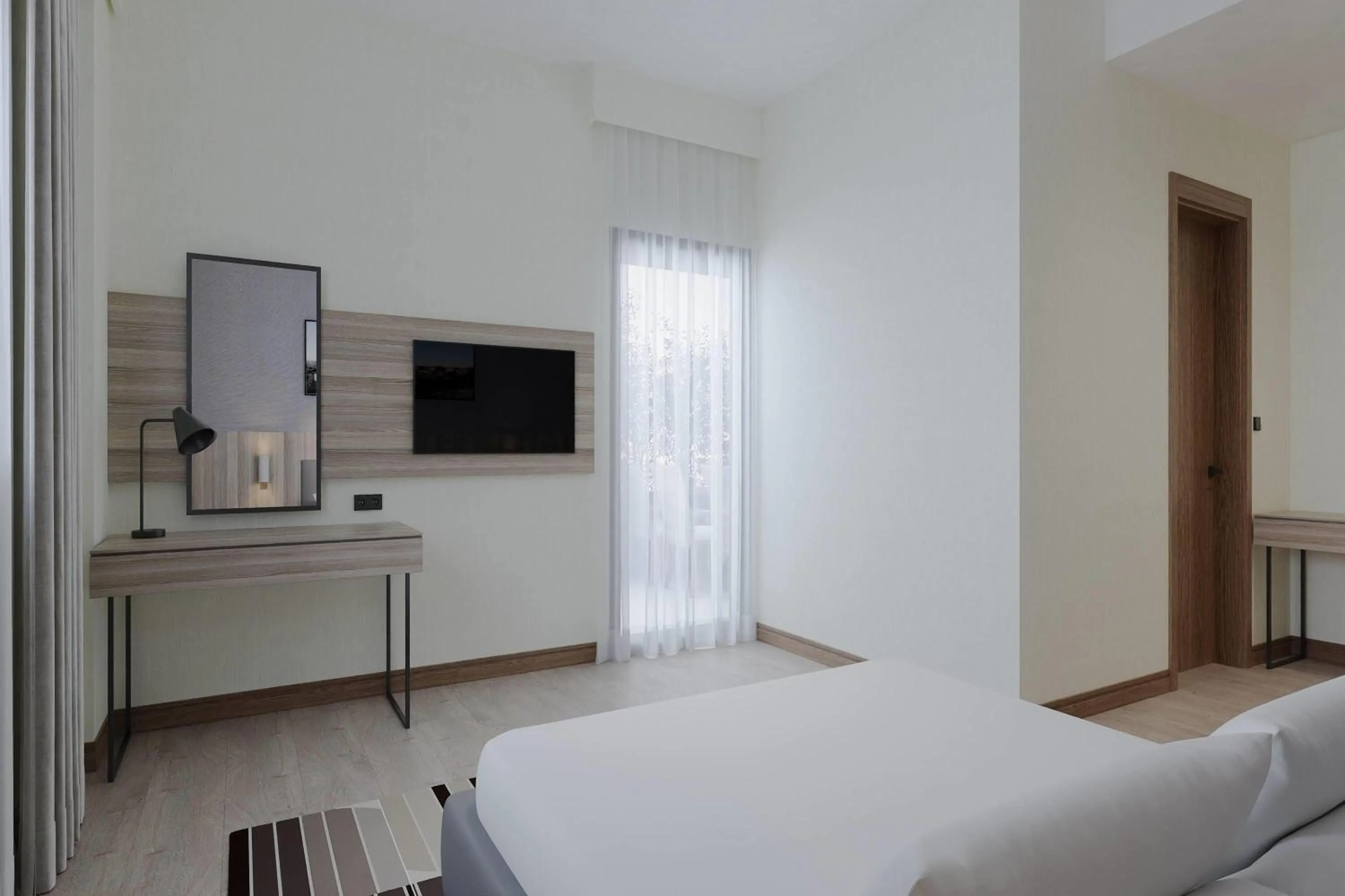 Bed in Ramada Encore by Wyndham Midyat