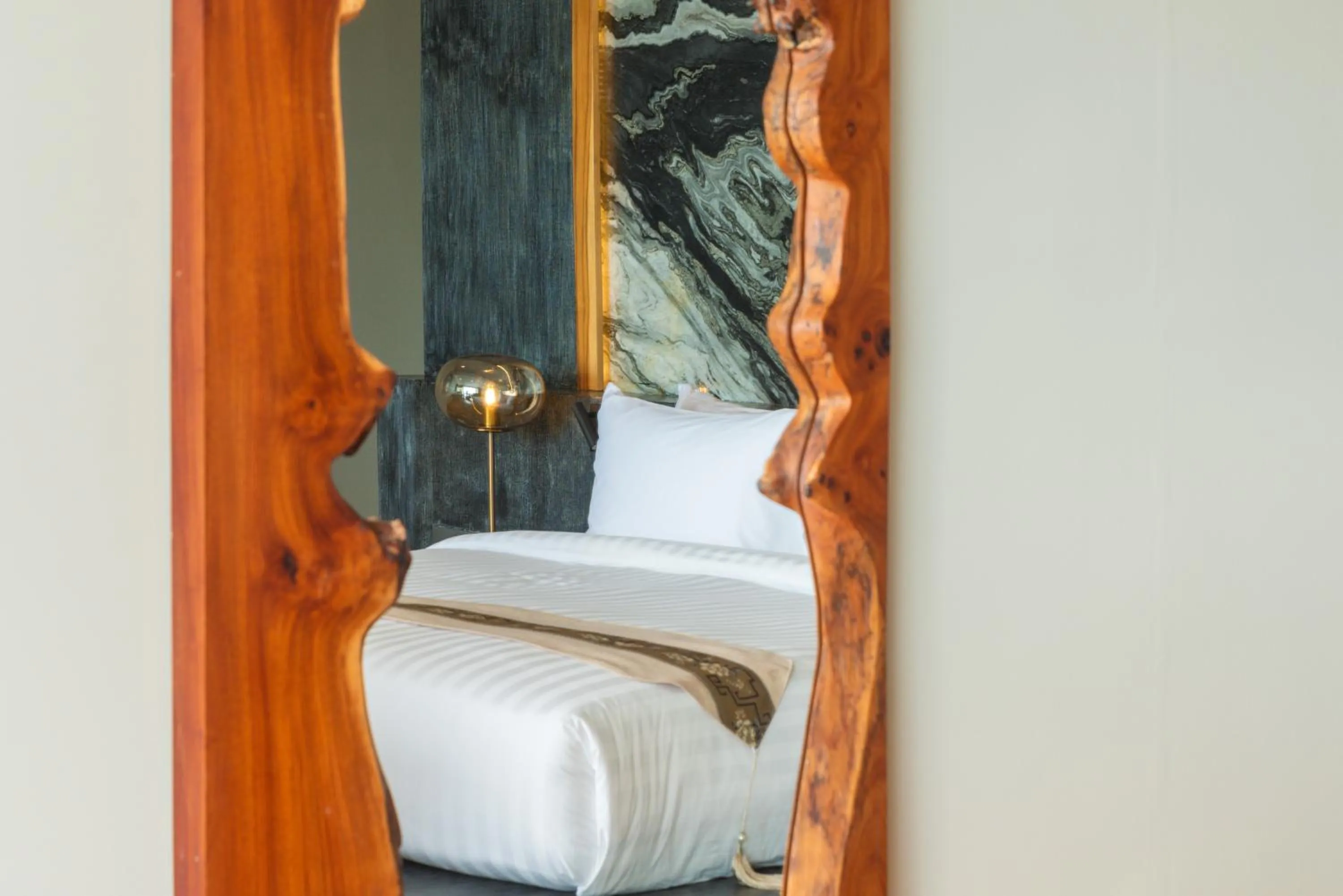 Bed in Ida B Domain Resort