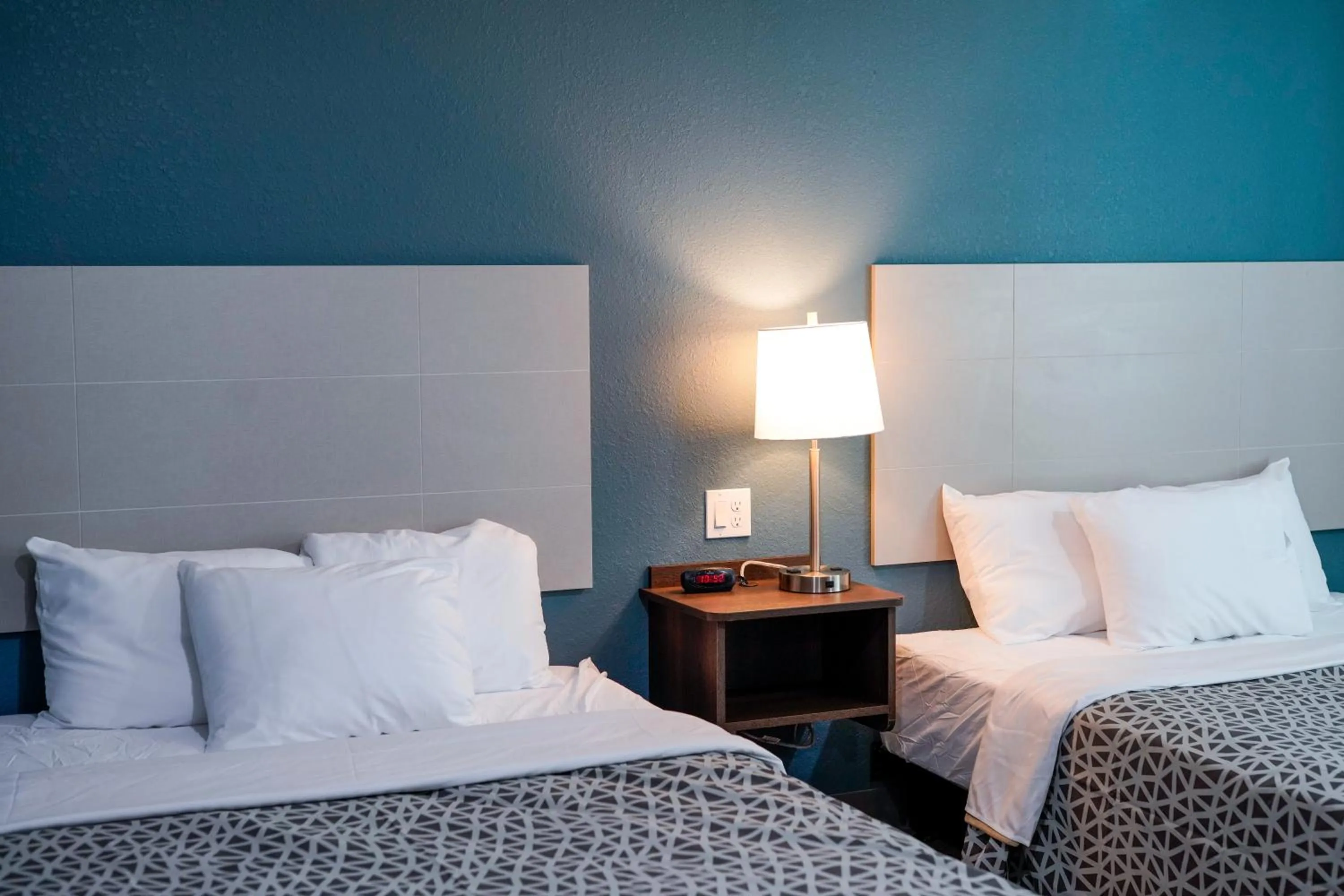 Bed in WoodSpring Suites Hudson Port Richey