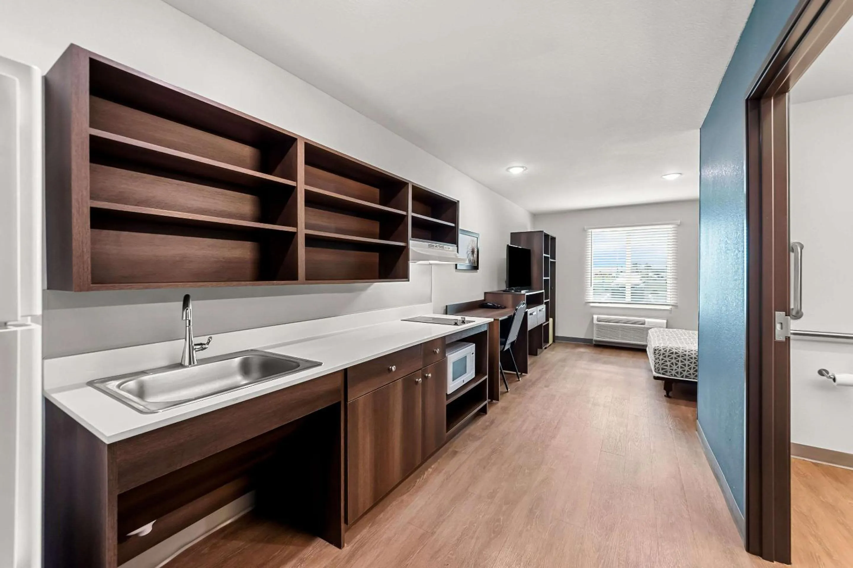 Bedroom in WoodSpring Suites Hudson Port Richey