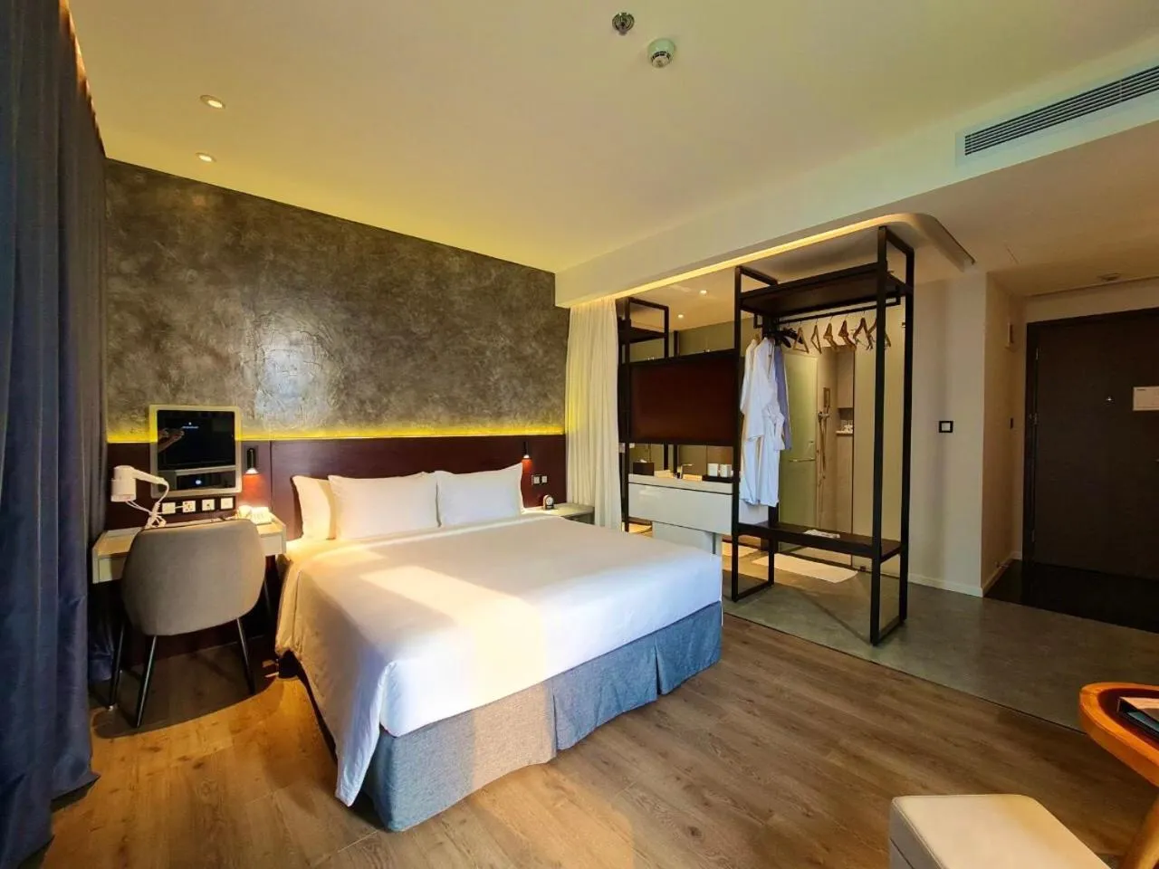 Bed in NEWCC HOTEL AND SERVICED APARTMENT
