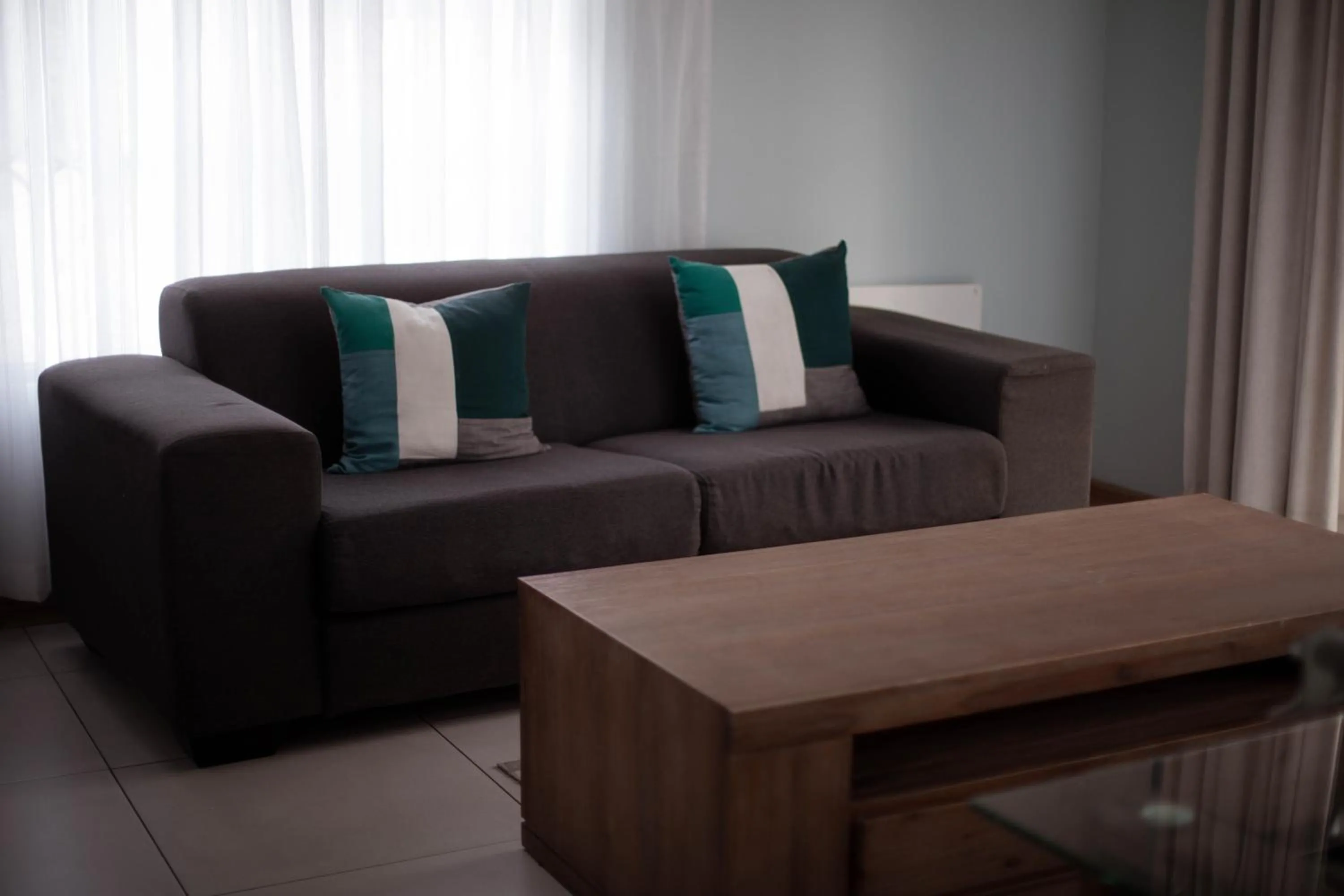 Living room in Three Stones Executive Apartments