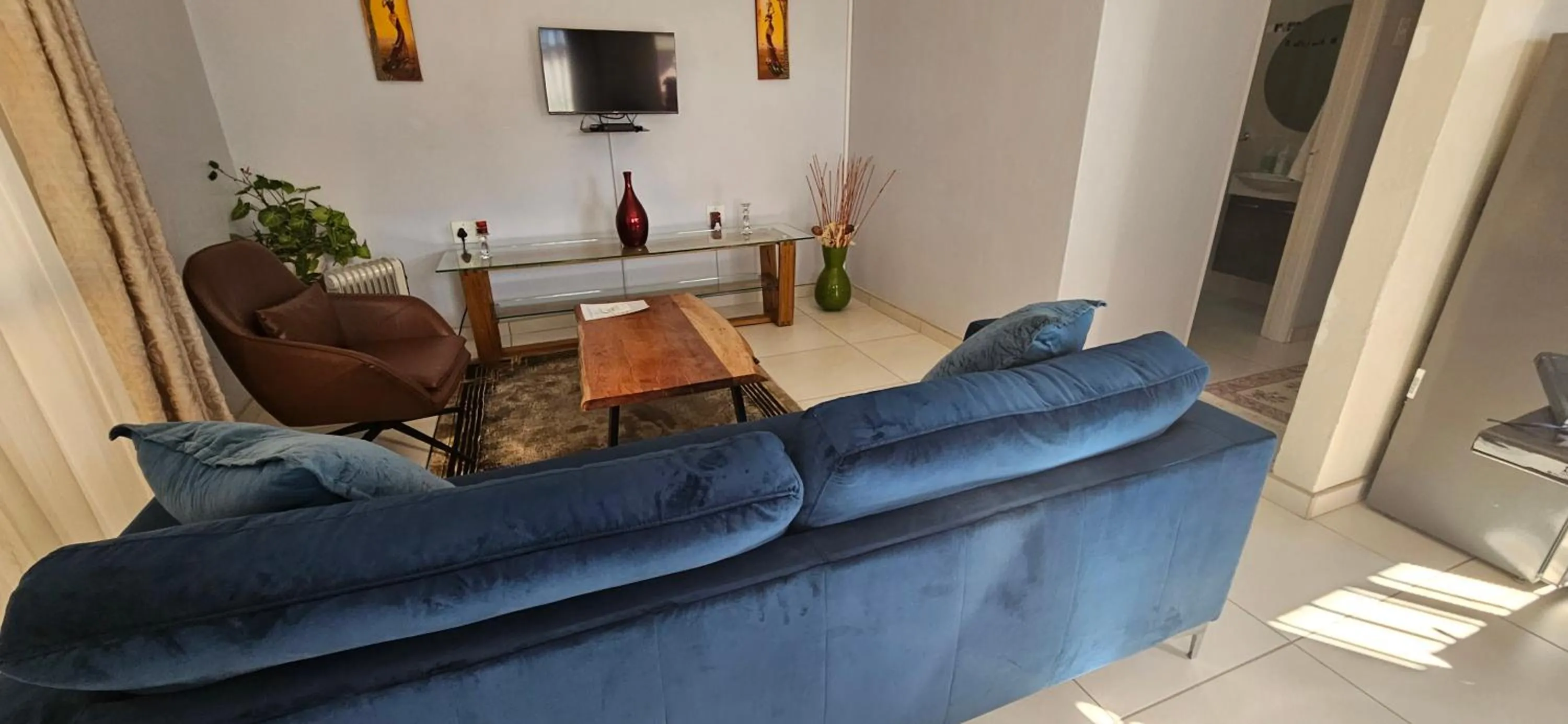Living room in Three Stones Executive Apartments