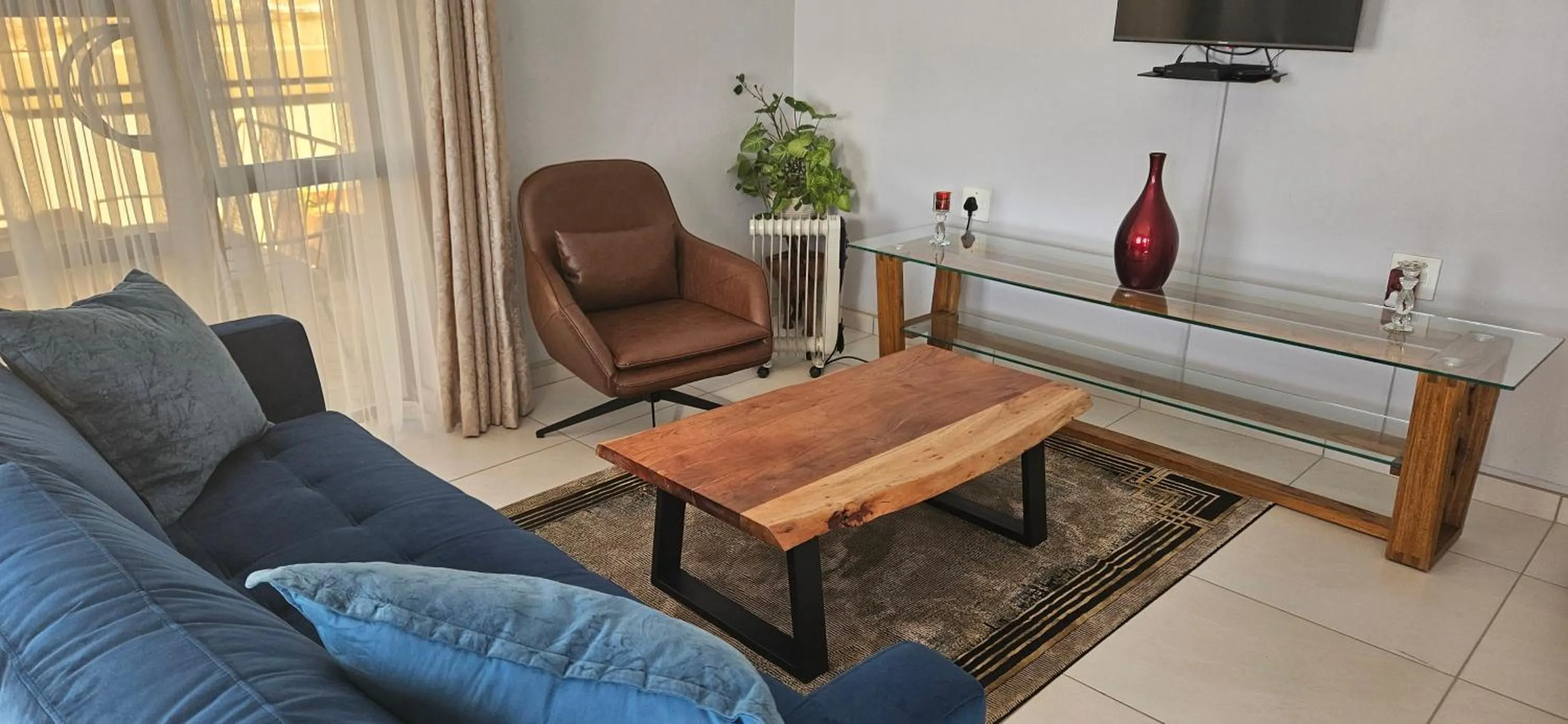 Living room in Three Stones Executive Apartments