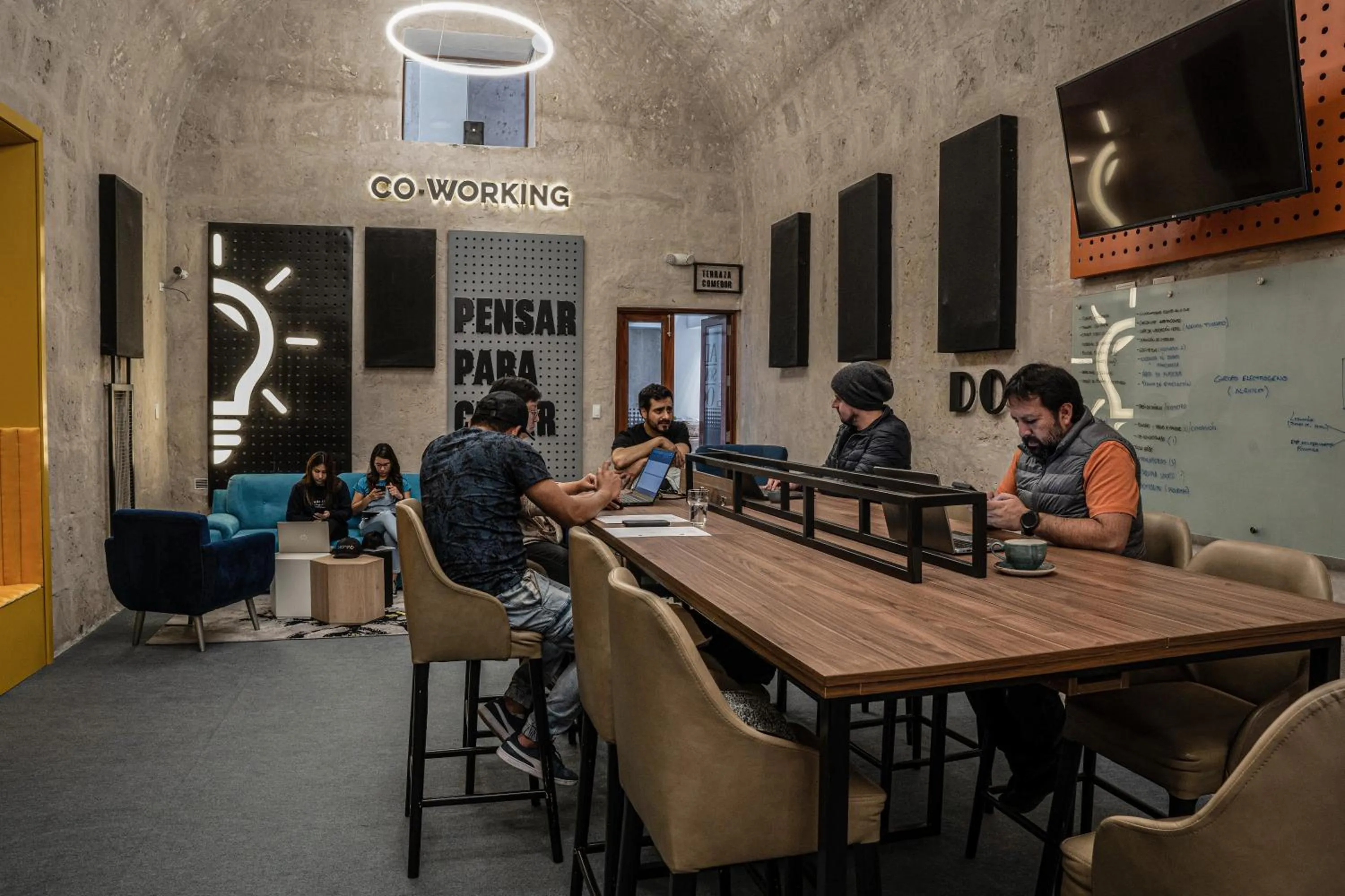 Seating area in QASA Arequipa by NOMAD