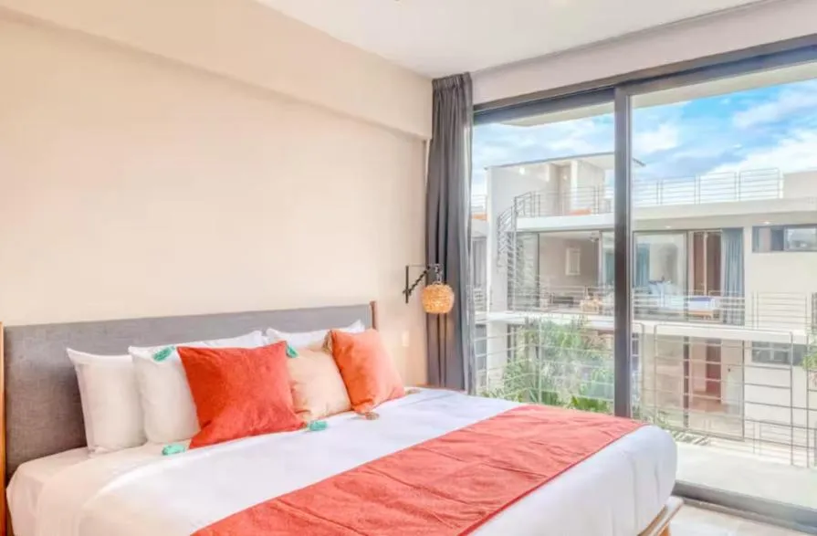 Bed in Amena Condo Tulum