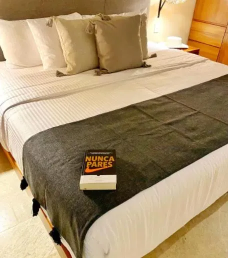 Bed in Amena Condo Tulum