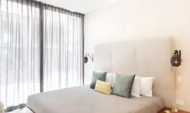 Bed in Amena Condo Tulum