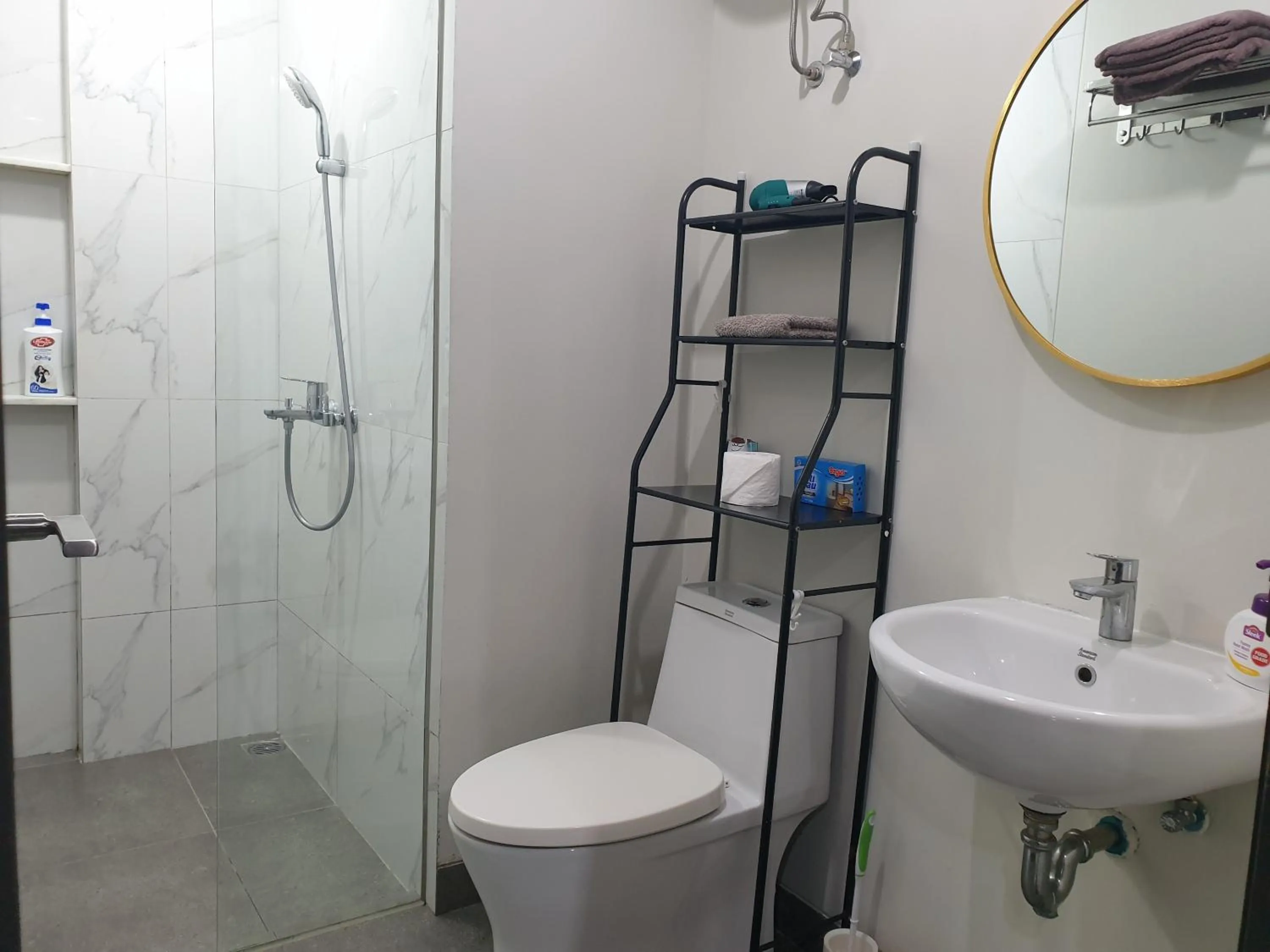 Shower in CozyHomes at One Residence Batam