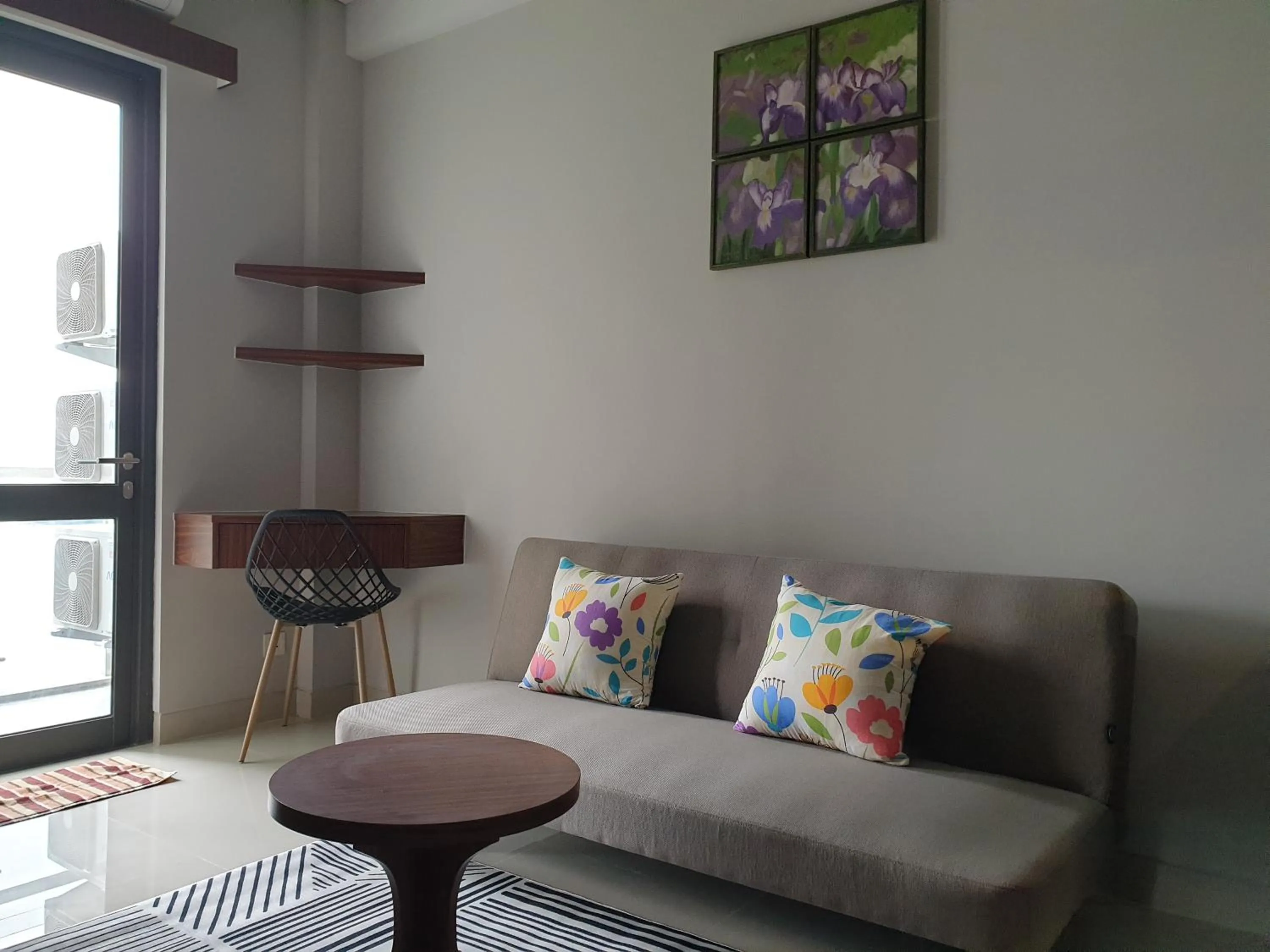 Living room in CozyHomes at One Residence Batam