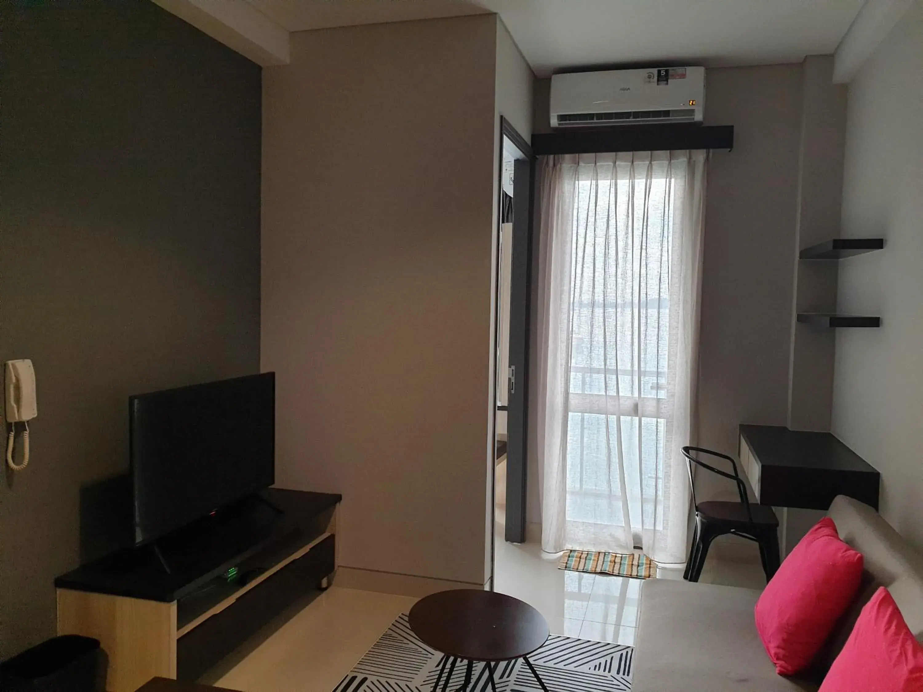 Living room in CozyHomes at One Residence Batam Living room in CozyHomes at One Residence Batam