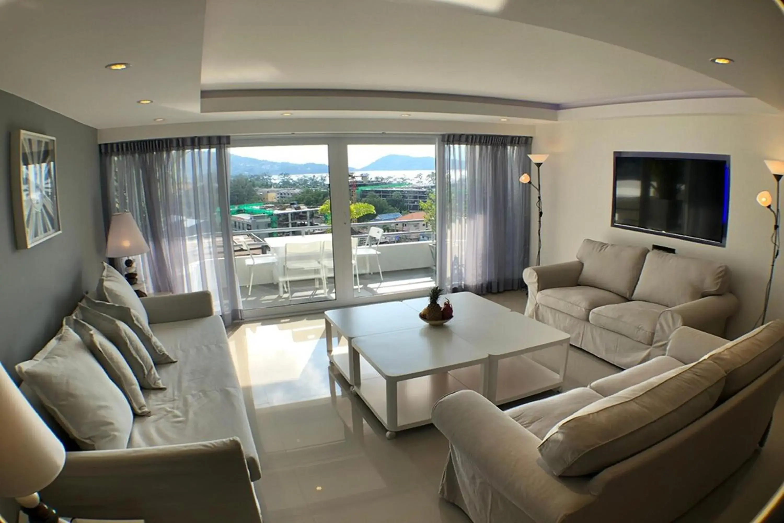 Living room in Swiss Villas Panoramic - Hillside Beach View Living room in Swiss Villas Panoramic - Hillside Beach View