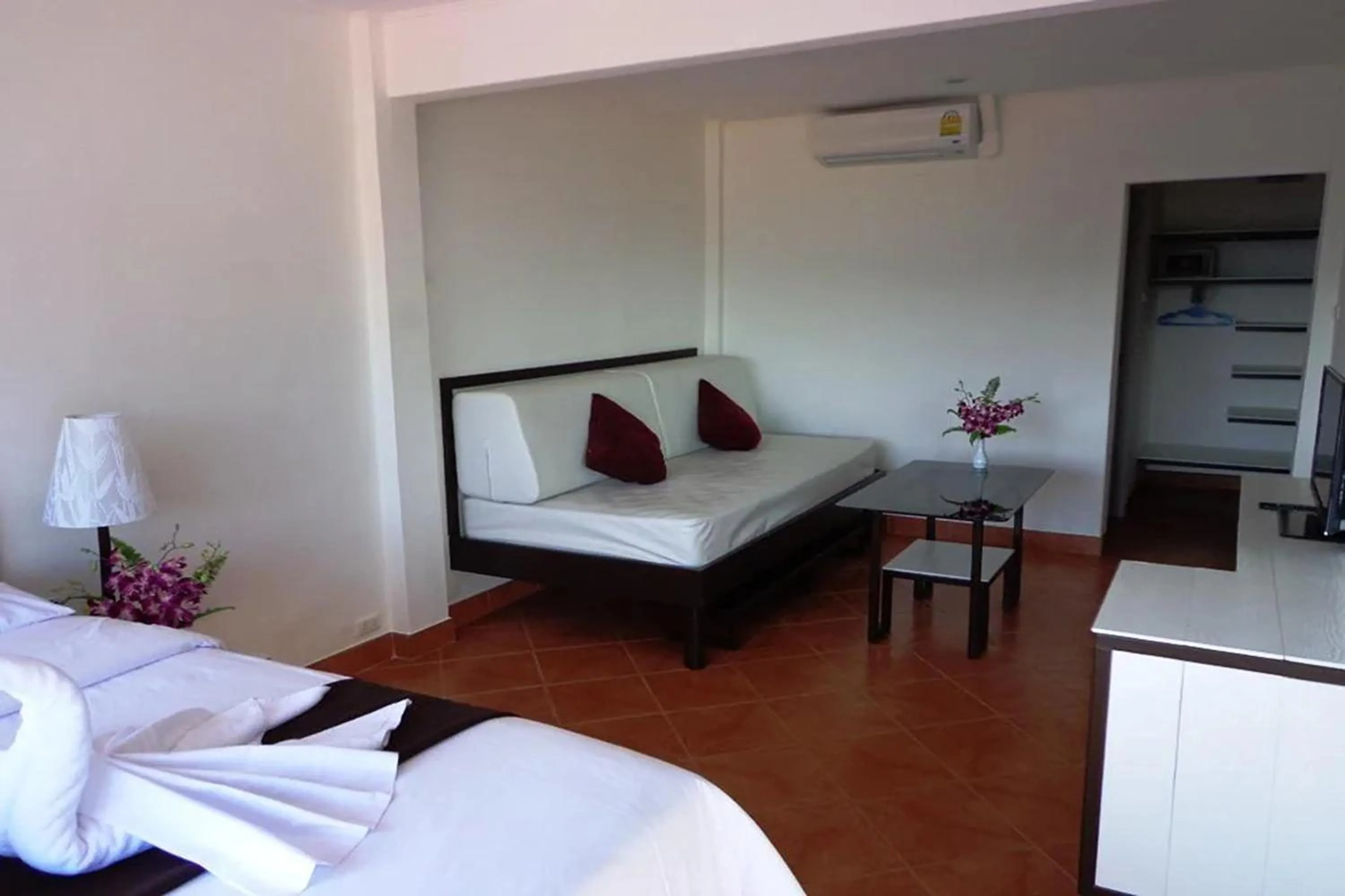 Living room, Bed in Swiss Villas Panoramic - SHA Certified