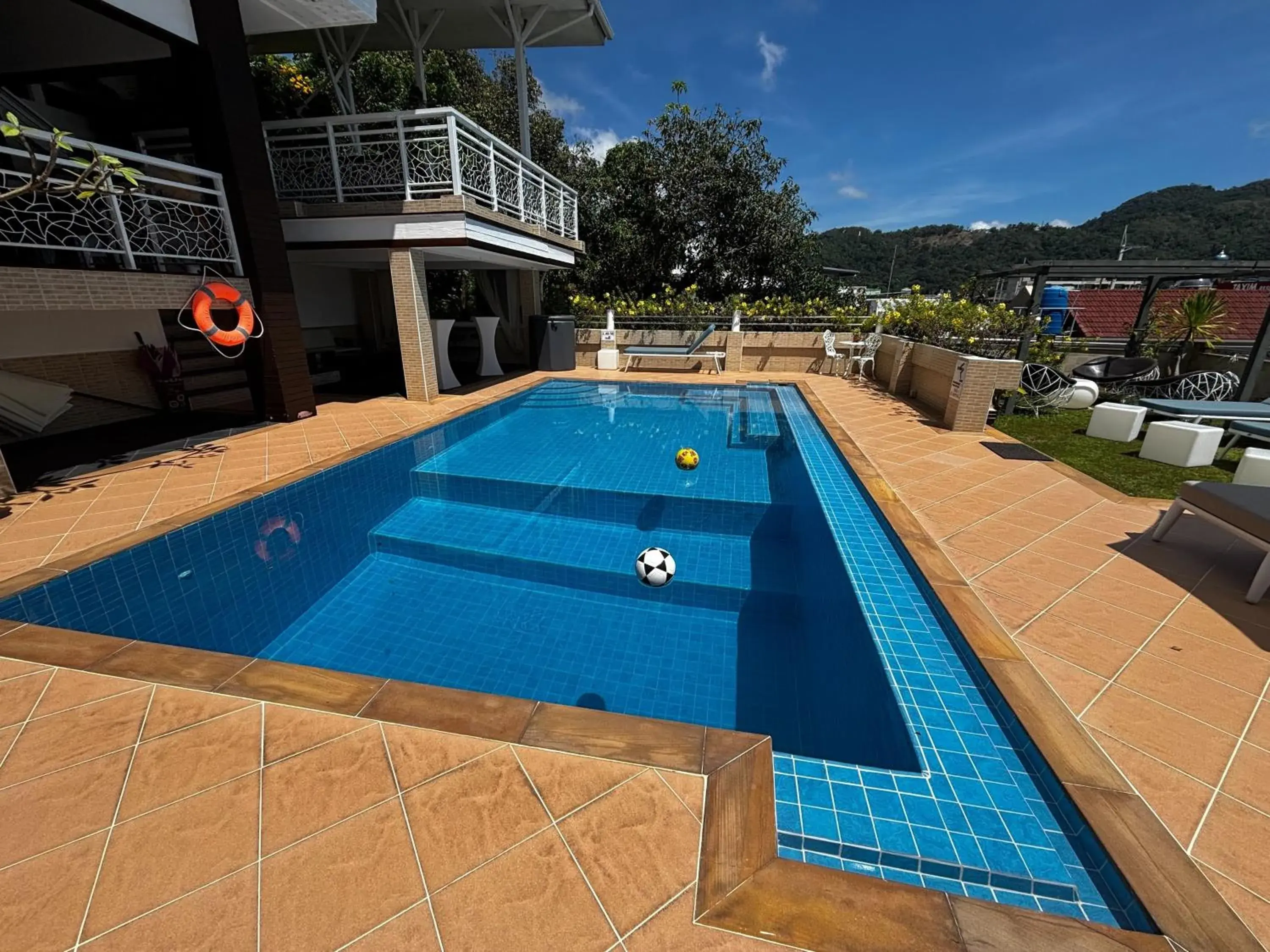 Day in Swiss Villas Panoramic - Hillside Beach View Day in Swiss Villas Panoramic - Hillside Beach View