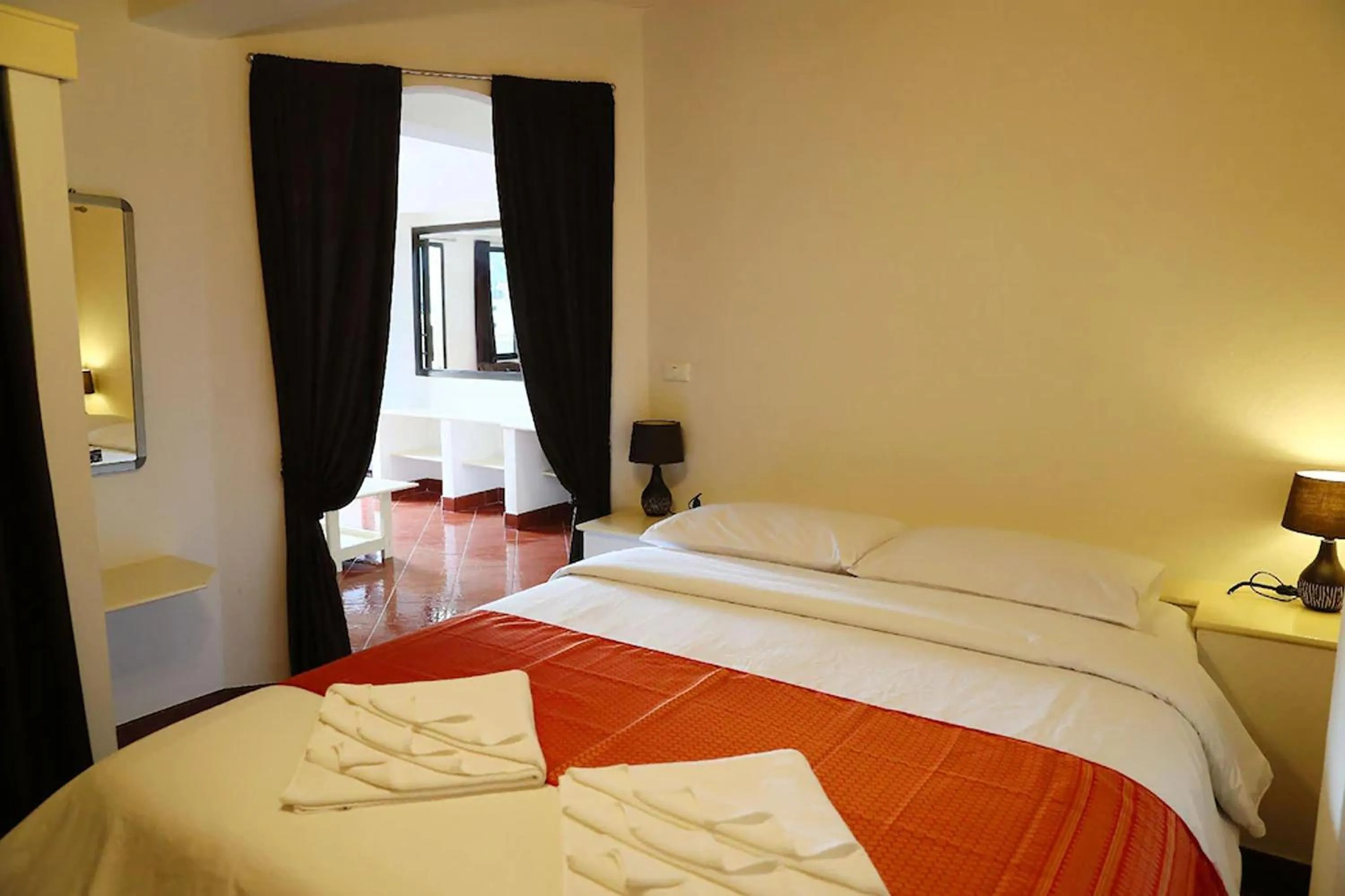 Bed in Swiss Villas Panoramic - SHA Certified