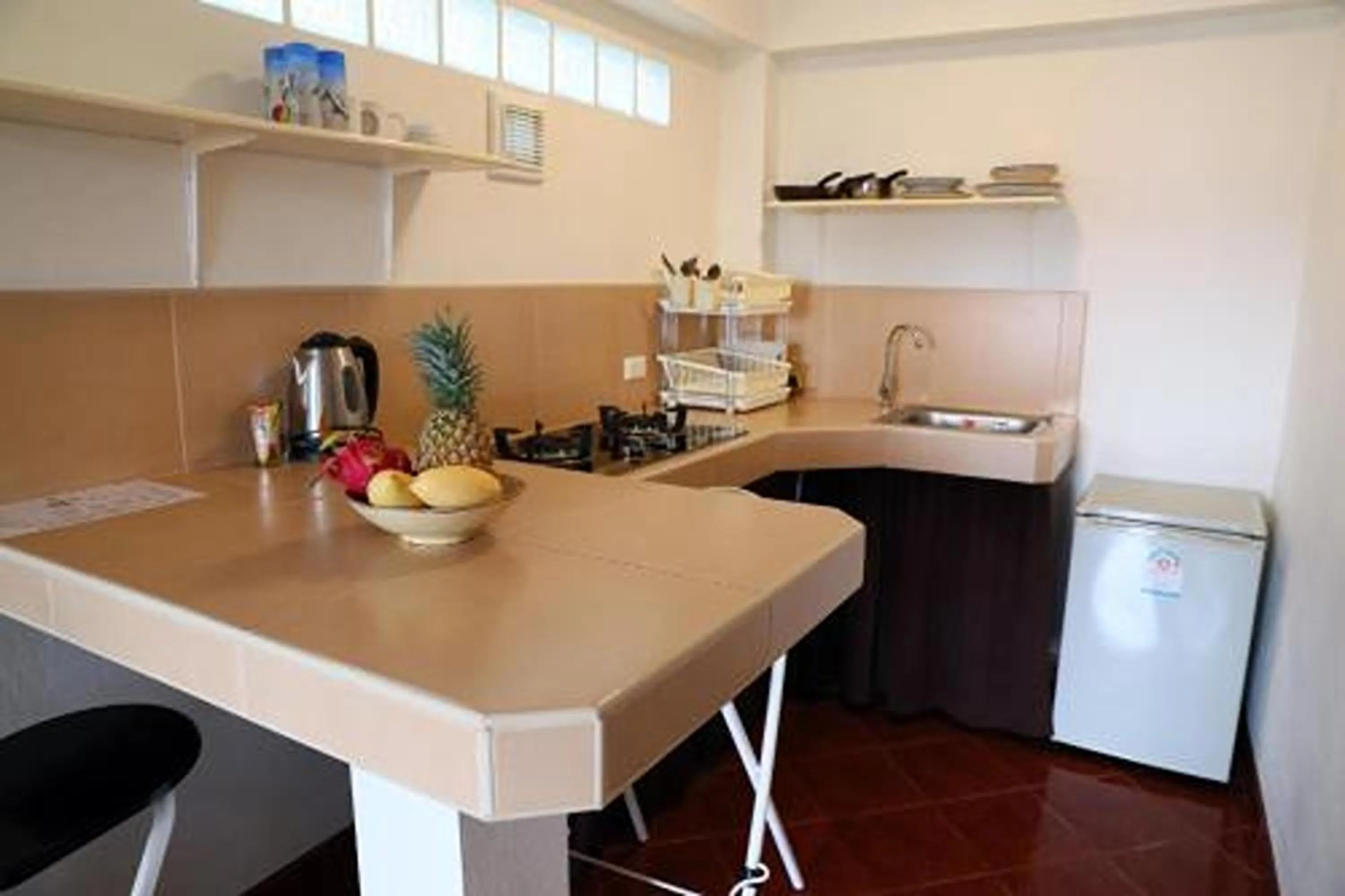 Kitchen or kitchenette in Swiss Villas Panoramic - SHA Certified
