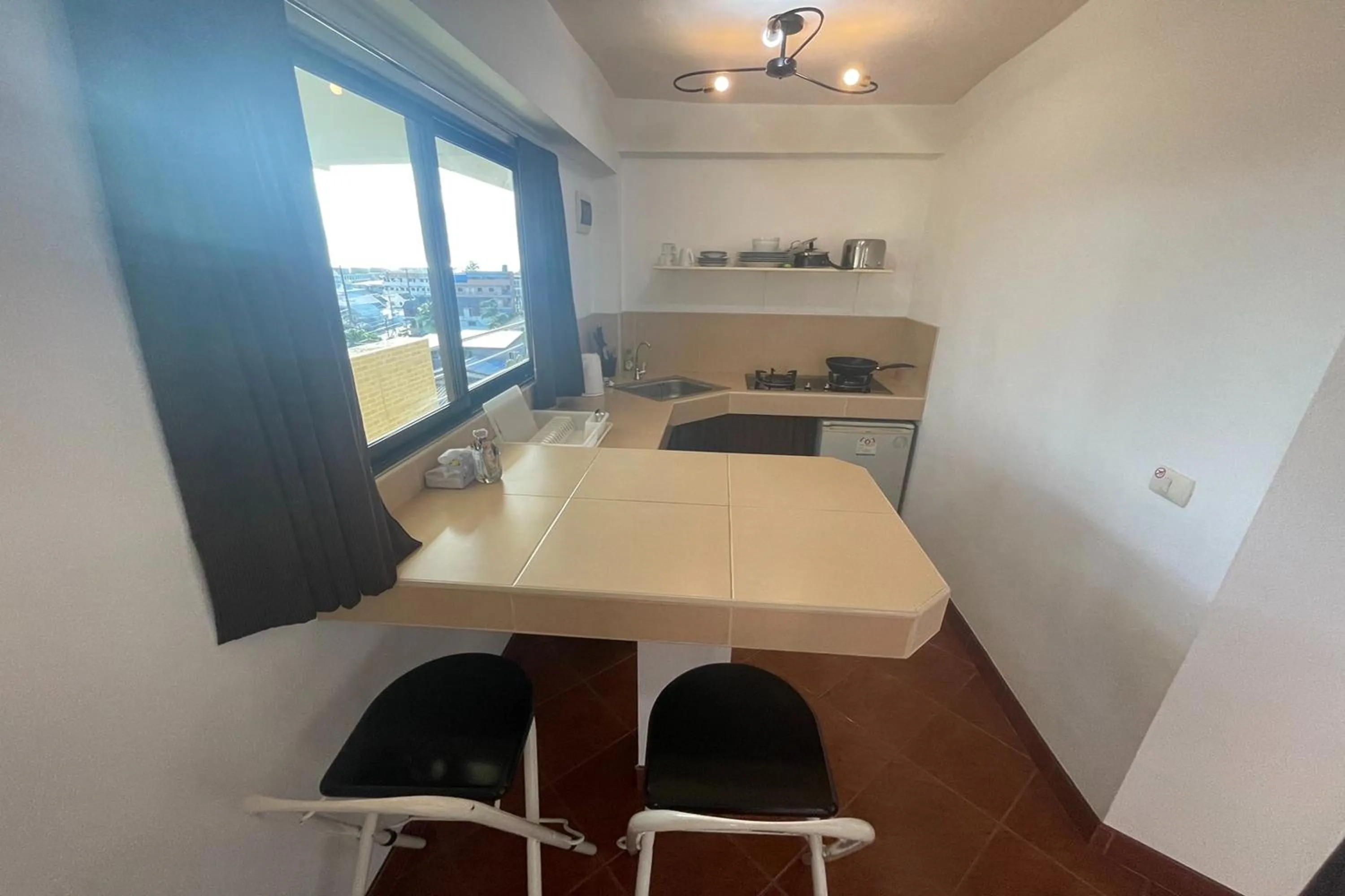 Kitchen or kitchenette in Swiss Villas Panoramic - SHA Certified