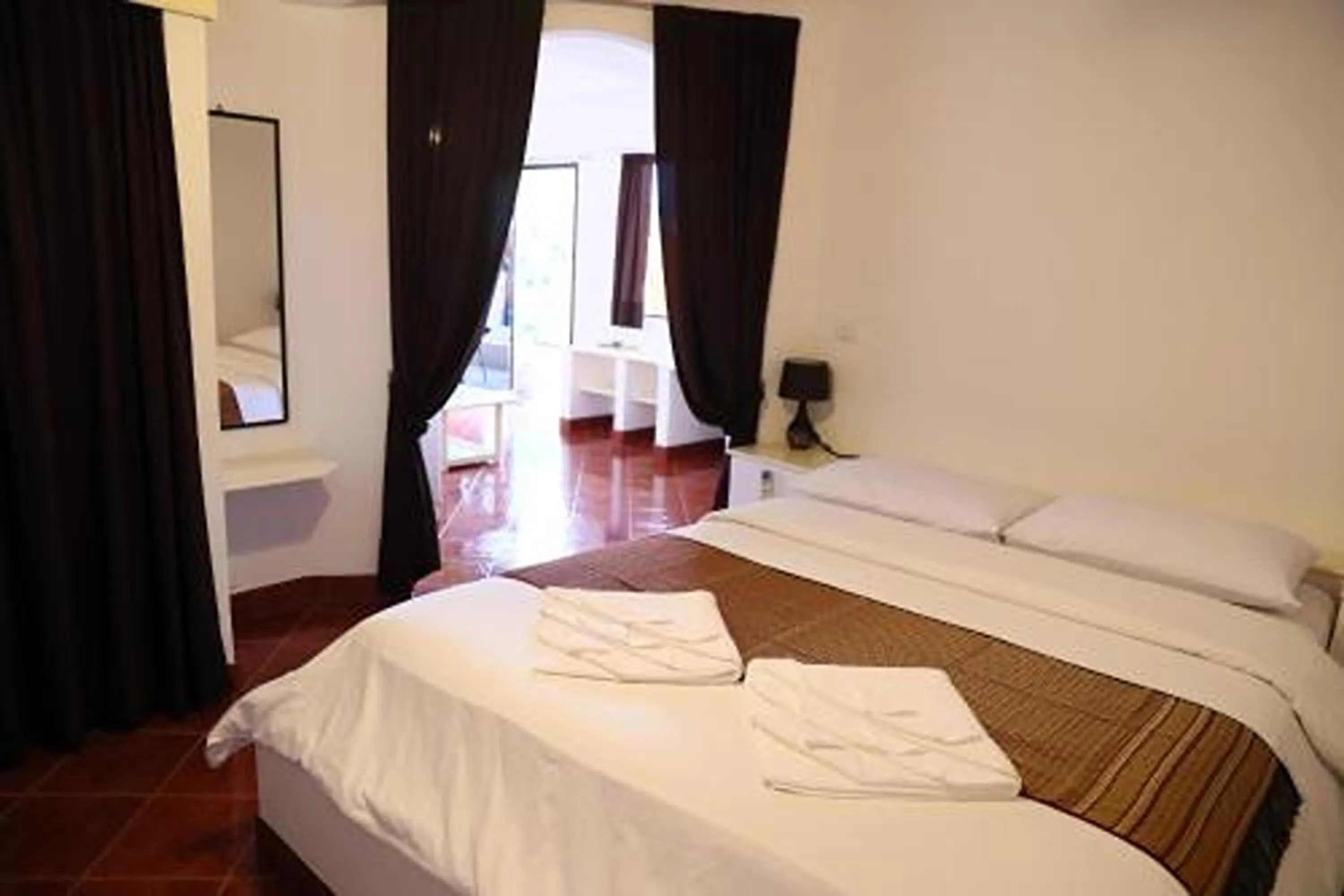 Bed in Swiss Villas Panoramic - SHA Certified