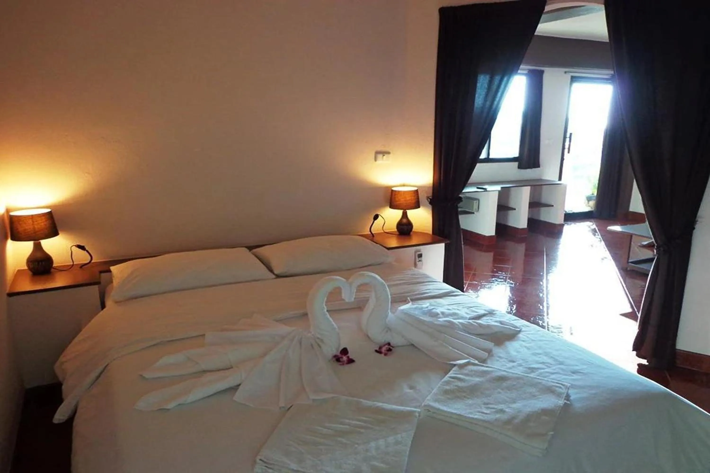 Bed in Swiss Villas Panoramic - SHA Certified