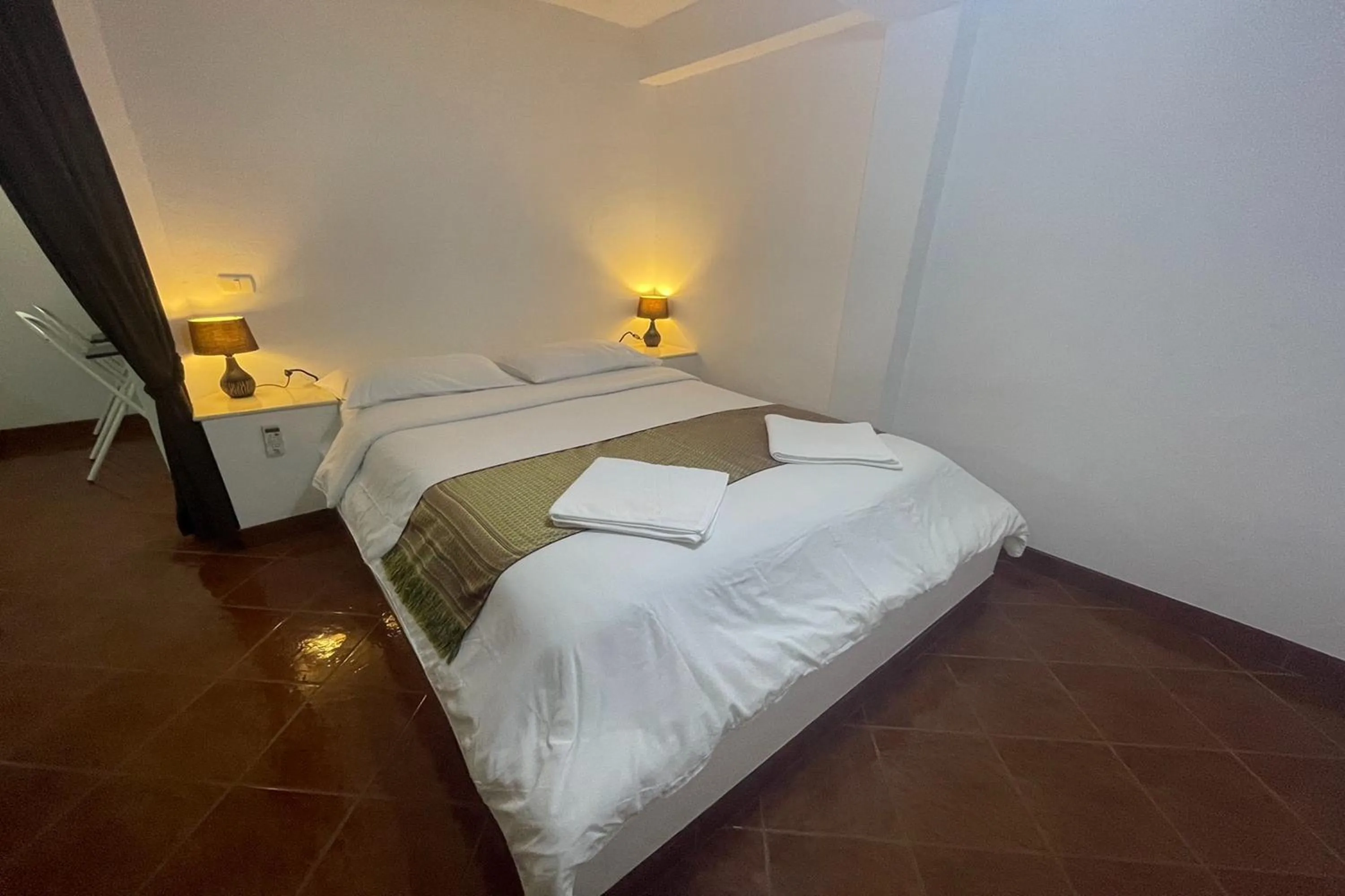 Bed in Swiss Villas Panoramic - SHA Certified