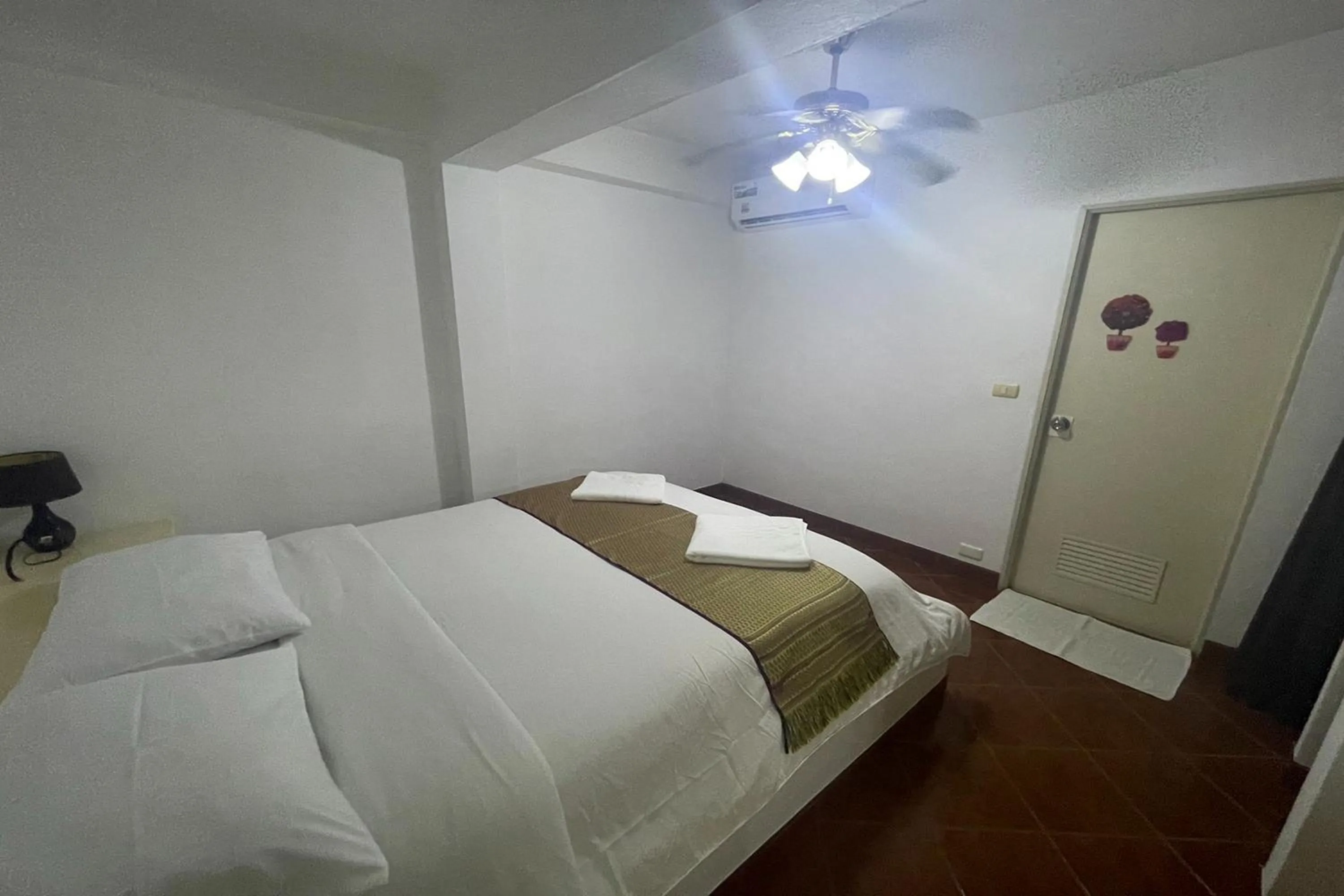 Bedroom, Bed in Swiss Villas Panoramic - SHA Certified