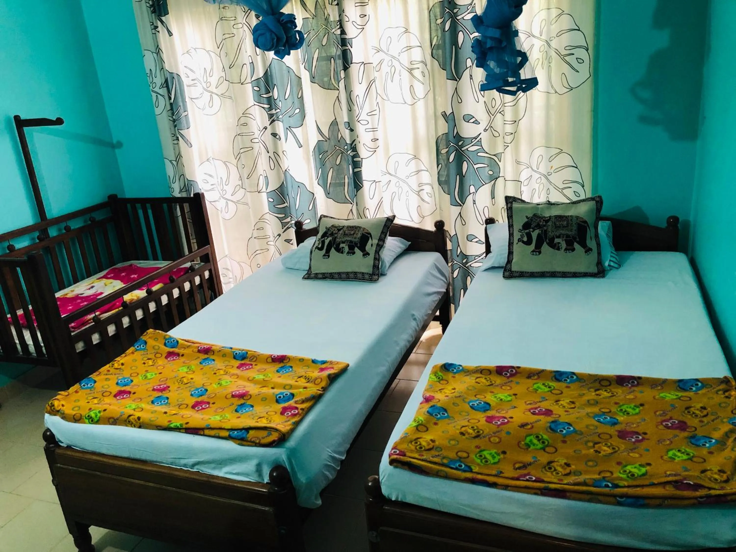 Bed in Araliya Holiday Bungalow