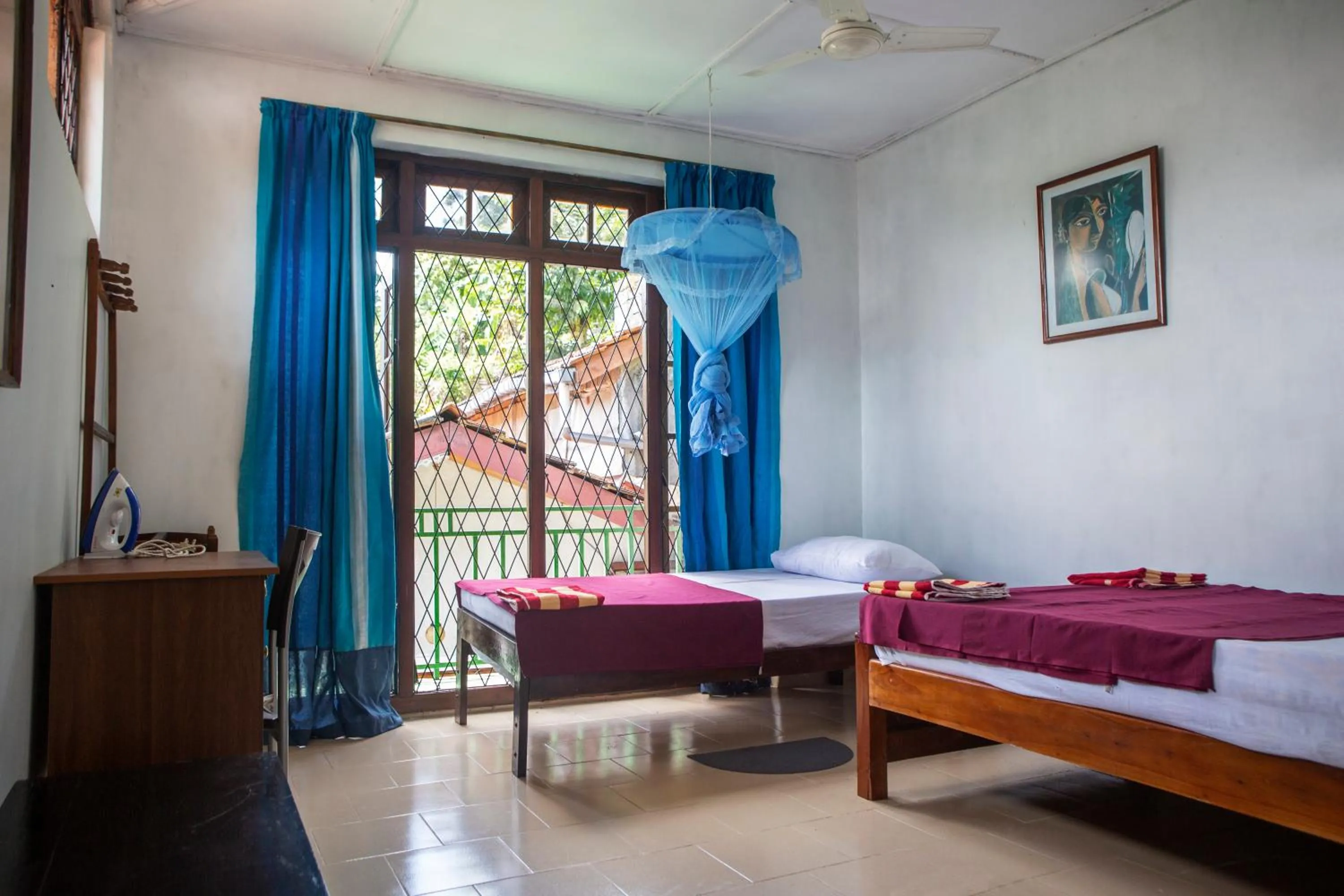 Bed in Araliya Holiday Bungalow