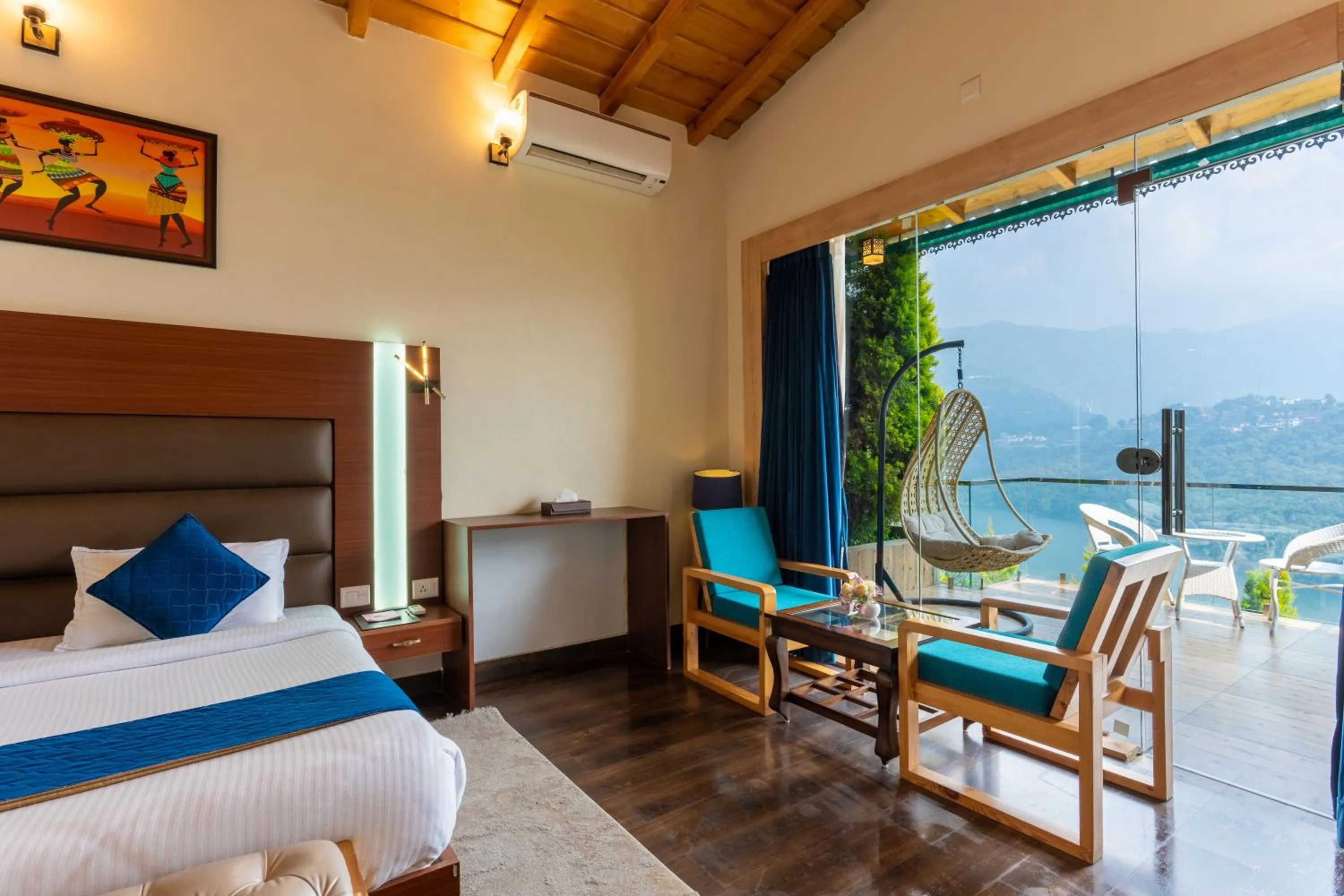 Seating area, Bed in The Lake Ambience Resort