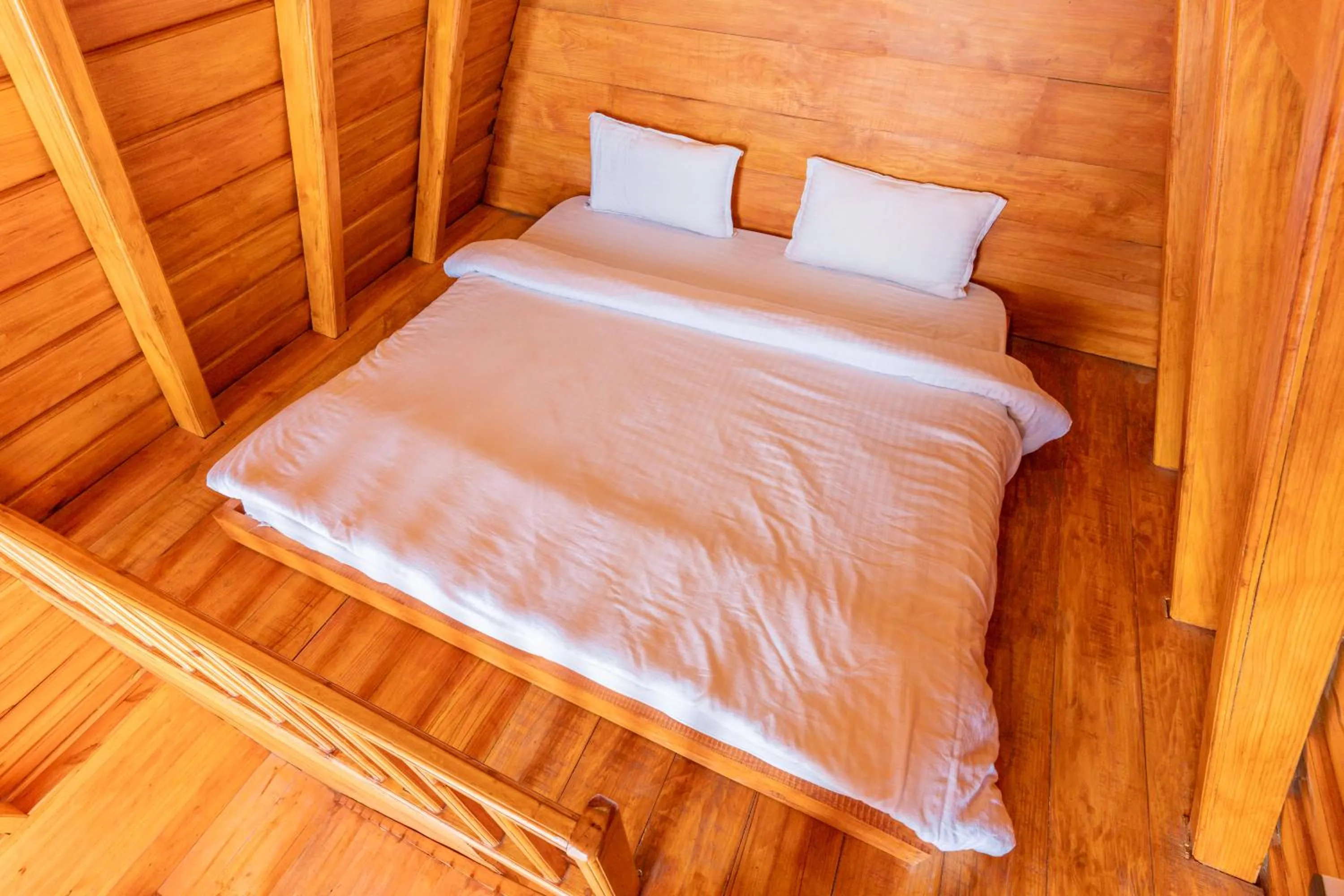 Bed in The Lake Ambience Resort