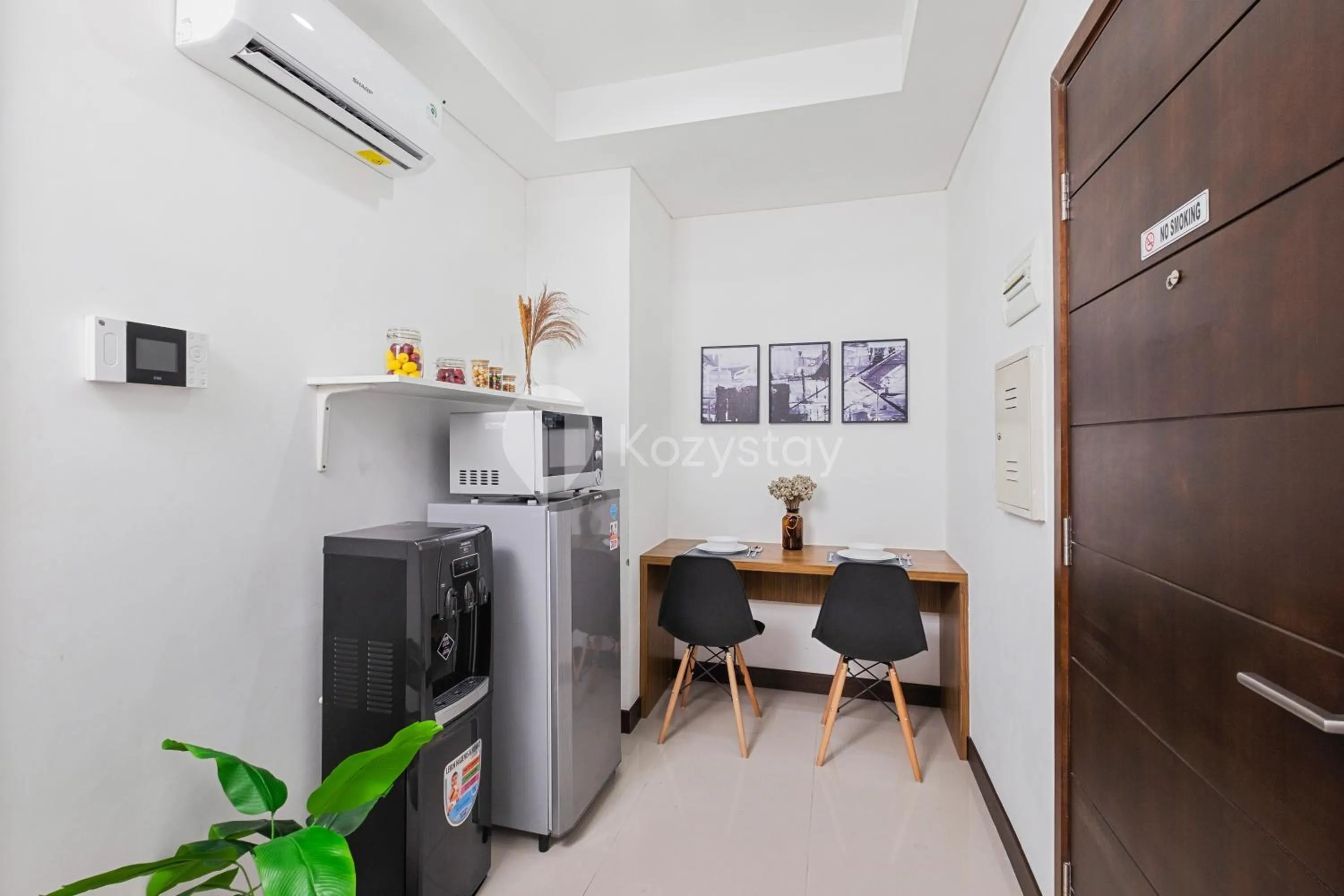 Kitchen or kitchenette in Orchid by Kozystay - Kebon Jeruk